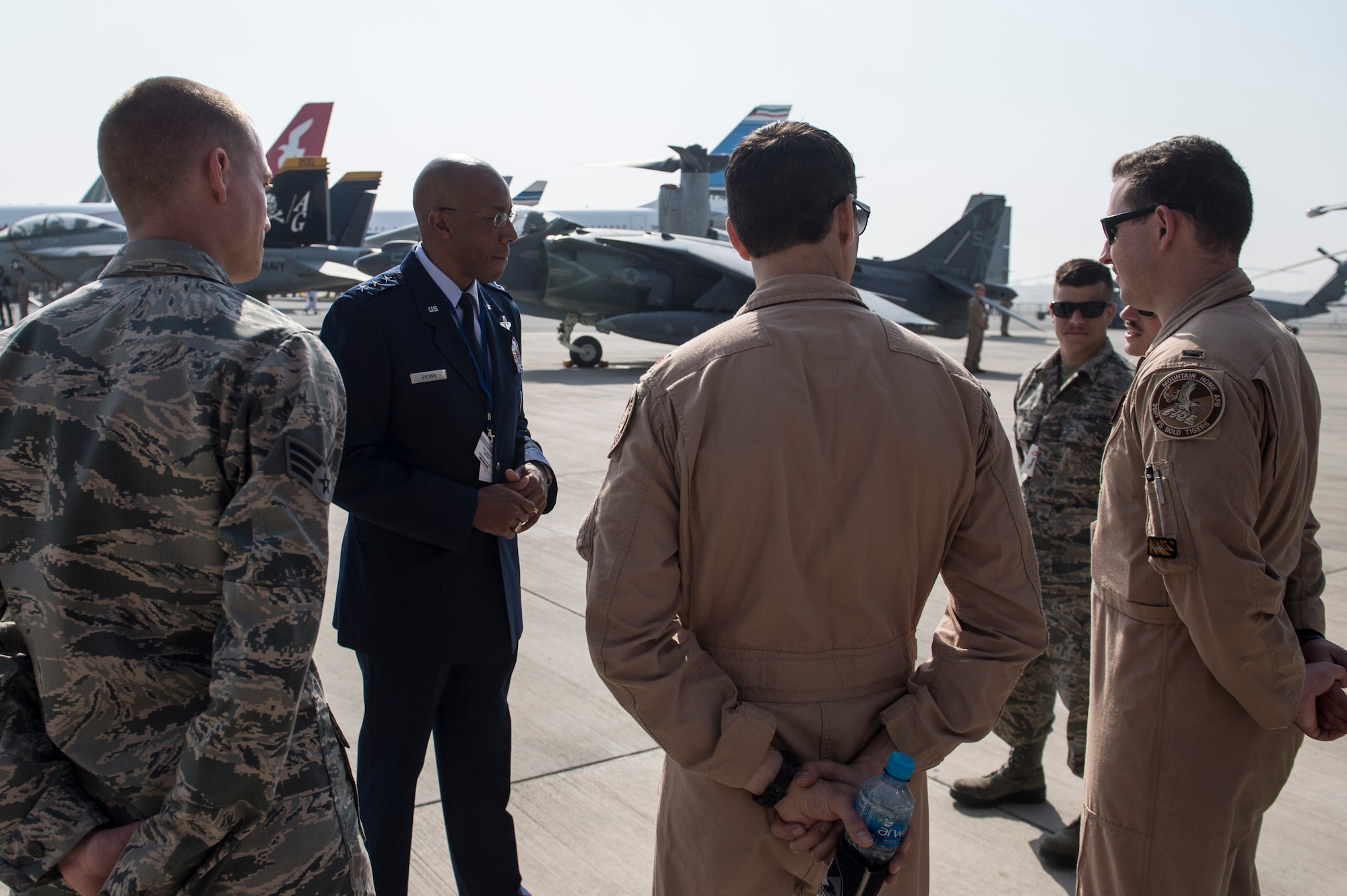 U.S. Air Force Lt. Gen. Charles Q. Brown, Jr., commander of U.S. Air Forces Central Command, speaks with U.S. military members at the Bahrain International Airshow at Sakhir Airbase in Manama, Bahrain, Jan. 21, 2016. The Bahrain International Airshow 2016 is a biennial, three-day aviation and aerospace industry event that provides the U.S. military an opportunity to highlight DOD aviation technology. (U.S. Air Force photo by Staff Sgt. Corey Hook/Released)