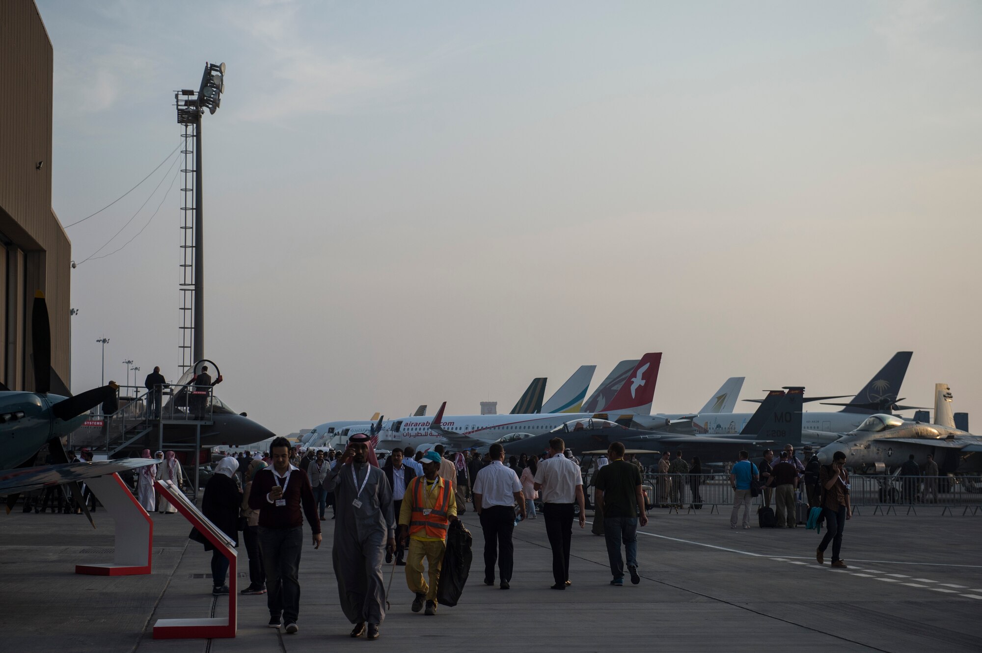 Spectators attend the Bahrain International Airshow at Sakhir Airbase in Manama, Bahrain, Jan. 21, 2016. The Bahrain International Airshow 2016 is a biennial, three-day aviation and aerospace industry event that provides the U.S. military an opportunity to highlight DOD aviation technology. (U.S. Air Force photo by Staff Sgt. Corey Hook/Released)