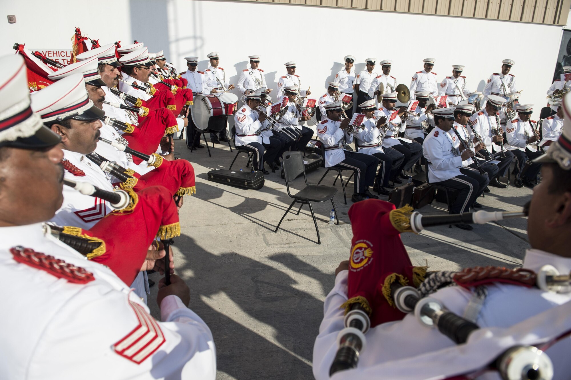 The Bahrain Police Band play at the Bahrain International Airshow at Sakhir Airbase in Manama, Bahrain, Jan. 23, 2016. The Bahrain International Airshow was held from Jan. 21-23, 2016. (U.S. Air Force photo by Staff Sgt. Corey Hook/Released)