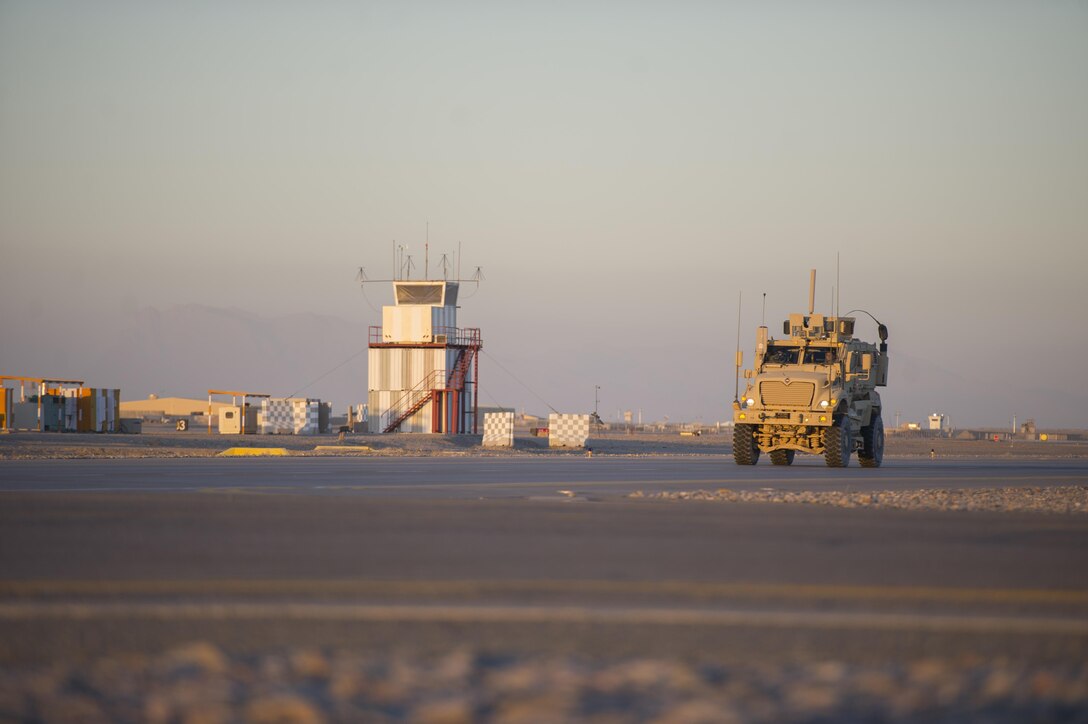 A mine resistant ambush protected vehicle, driven by an Air Force airman patrols the flightline on Kandahar Airfield, Afghanistan, Jan. 20, 2016. U.S. Air Force photo by Tech. Sgt. Robert Cloys