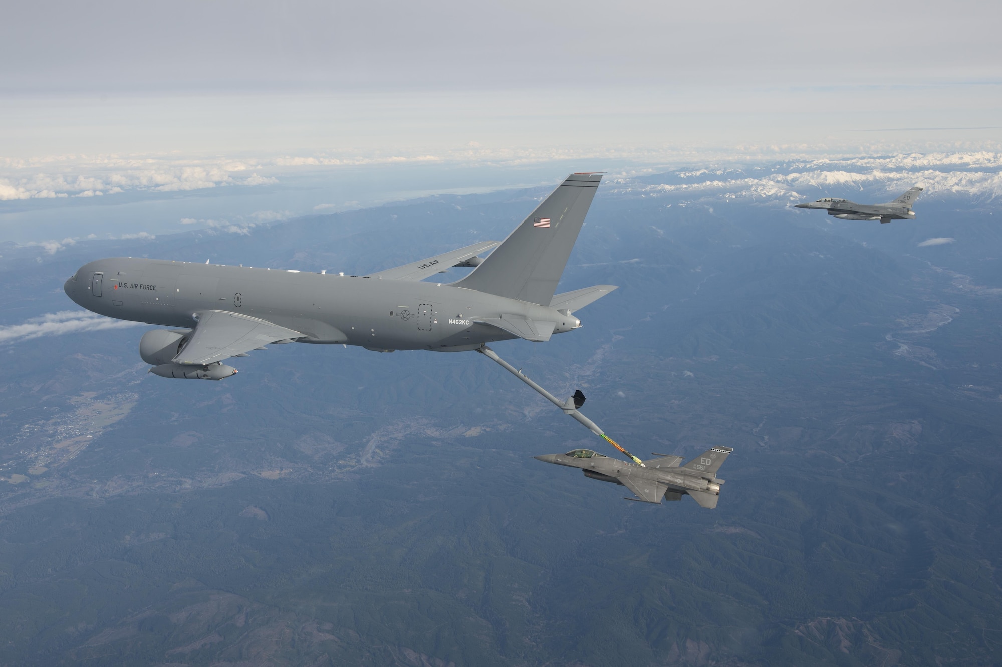 The KC-46A Pegasus performs its first-ever aerial refueling Jan. 24, 2016, passing 1,600 pounds of fuel to an F-16 Fighting Falcon. (Boeing photo/Paul Weatherman)
