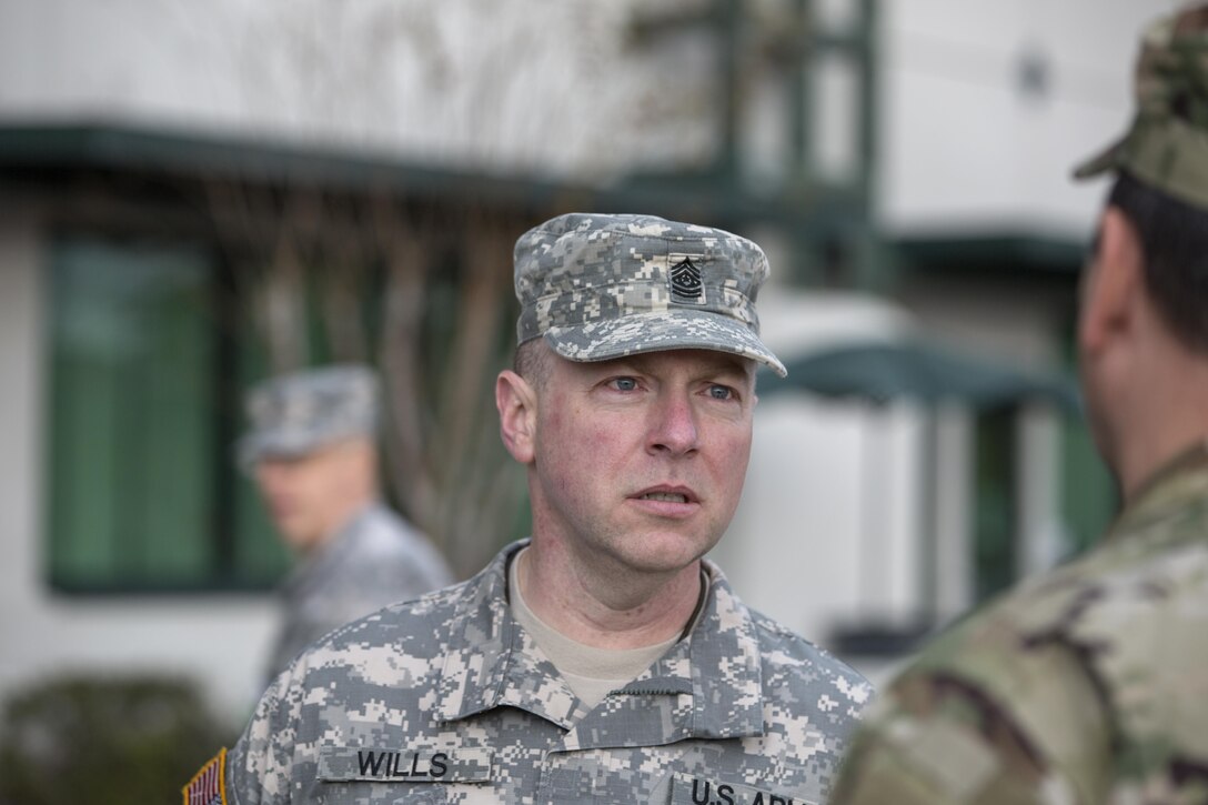 U.S. Army Reserve Command Sgt. Maj. James Wills talks to an Army Reserve Soldier after final formation during the Army Reserve Medical Command’s battle training assembly. Wills attended the Sergeant Major Advisory Board Light hosted by Command Sgt. Maj. Marlo V. Cross, ARMEDCOM, at the C.W. Bill Young Armed Forces Reserve Center in Pinellas Park, Fla., Jan. 22, 2016. (U.S. Army photo by Spc. Tracy McKithern/Released)