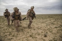 U.S. Marines with Charlie Company, 1st Battalion 7th Marine Regiment, Special Purpose Marine Air-Ground Task Force-Crisis Response-Central Command, recover a simulated casualty as part of a Tactical Recovery of Aircraft and Personnel exercise at an Undisclosed Location in Southwest Asia Jan. 12, 2016. SPMAGTF-CR-CC is ready to respond to any crisis response mission in theater to include the employment of a TRAP force. (U.S. Marine Corps photo by Cpl. Akeel Austin/Released)