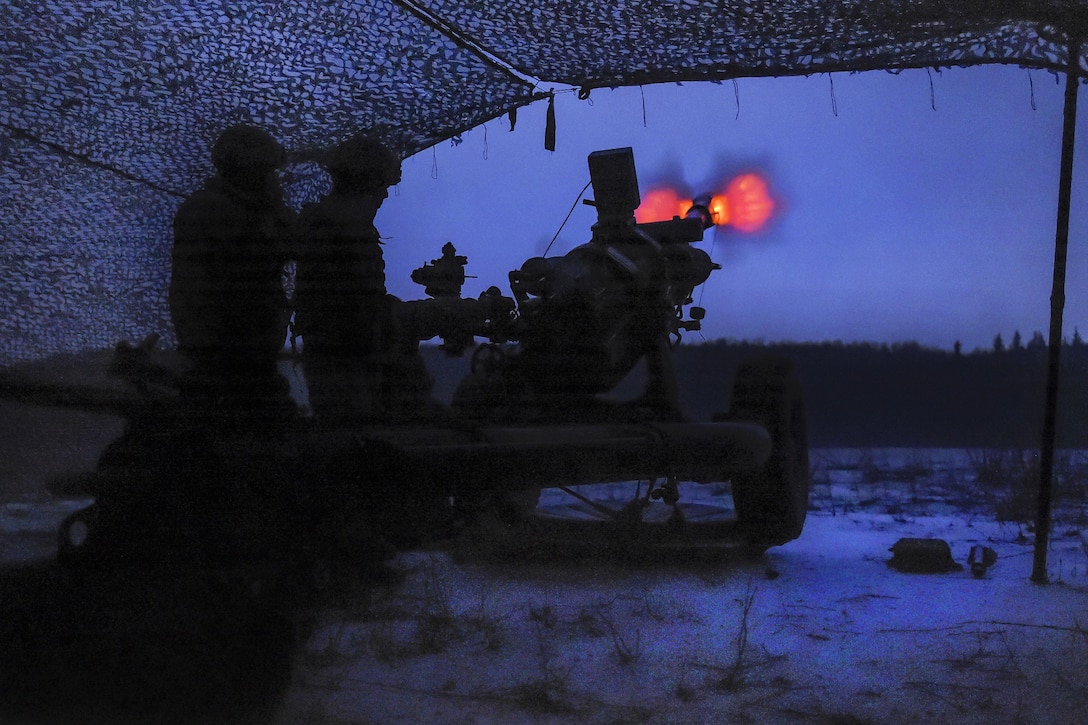Paratroopers fire high-explosive rounds from an M119A2 105mm howitzer during live-fire training on Joint Base Elmendorf-Richardson, Alaska, Jan. 11, 2016. U.S. Air Force photo by Alejandro Pena