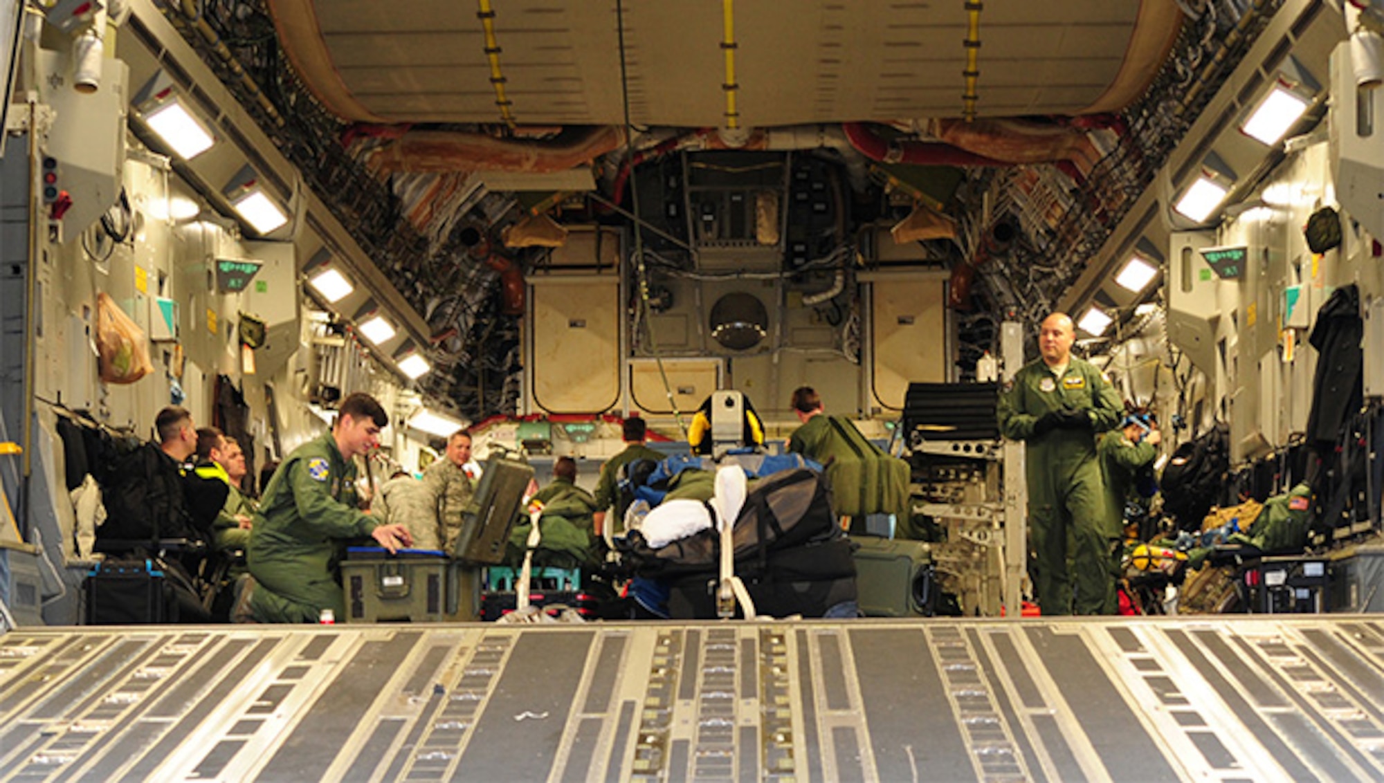 Members of the 315th Airlift Wing at Joint Base Charleston, S.C. prepare for departure for a training mission to Ramstein Air Base, Germany Jan. 21, 2016.