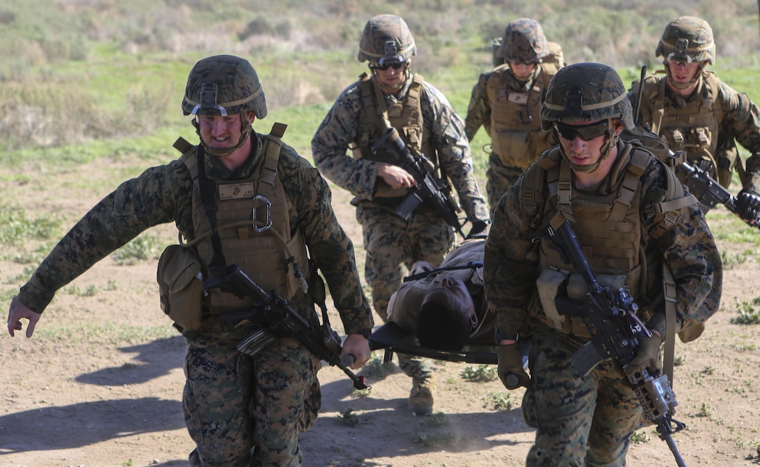 Marines preparing to deploy with the 31st Marine Expeditionary Unit carry an injured Marine on a litter to an MV-22B Osprey with Marine Medium Tiltrotor Squadron (VMM) 161 during casualty-evacuation training aboard Marine Corps Base Camp Pendleton, Calif., Jan. 20. Casualty-evacuation training prepares the Marines to land in a combat zone, pick up injured Marines and transport them to a safe area. (U.S. Marine Corps photo by Lance Cpl. Kimberlyn Adams/Released)