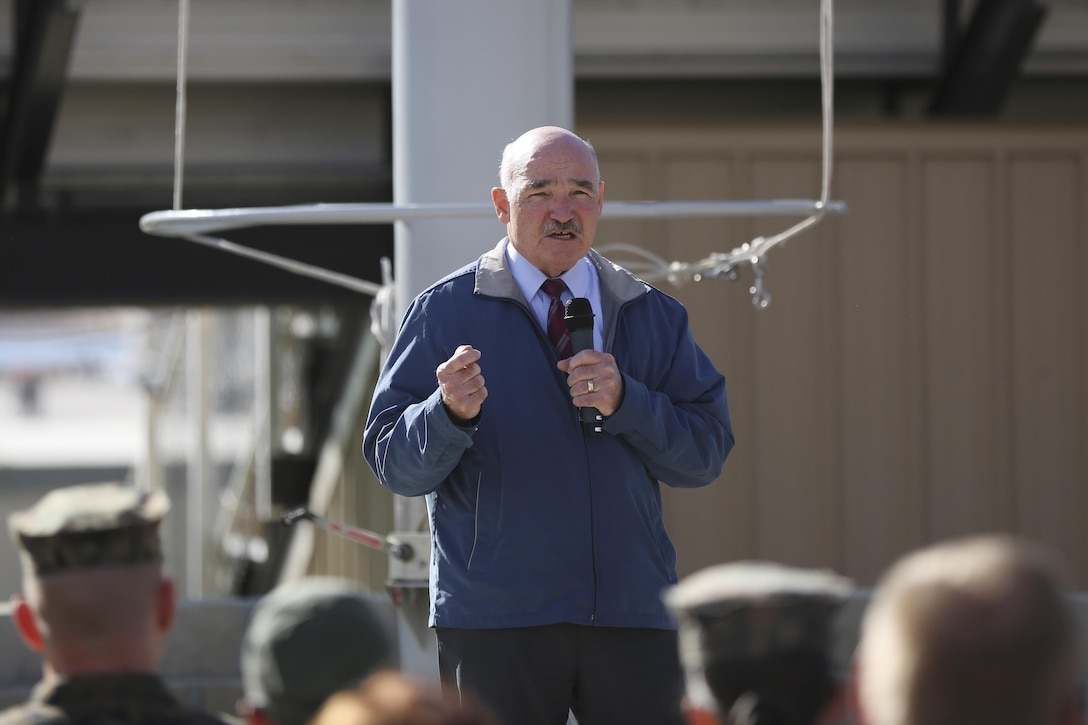 The Honorable Dennis V. McGinn, Assistant Secretary of the Navy, addresses distinguished guests and personnel of the Combat Center at Lance Cpl. Torrey L. Gray Field, Jan. 21, 2016. McGinn visited the Combat Center to award Exercise Support Division the 2015 Secretary of the Navy Energy and Water Management Award in the United States Marine Corps Expeditionary category. McGinn also recognized the Combat Center as an installation, for a Gold Level of Achievement under the awards program, which indicates a very good to outstanding energy or water program. (Official Marine Corps photo by Cpl. Medina Ayala-Lo/Released)
