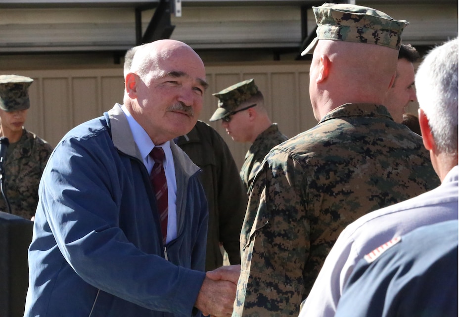 The Honorable Dennis V. McGinn, Assistant Secretary of the Navy, thanks members of Exercise Support Division after presenting the unit with the 2015 Secretary of the Navy Energy and Water Management Award in the United States Marine Corps Expeditionary category. McGinn also recognized the Combat Center as an installation, for a Gold Level of Achievement under the awards program, which indicates a very good to outstanding energy or water program.  (Official Marine Corps photo by Cpl. Medina Ayala-Lo/Released)