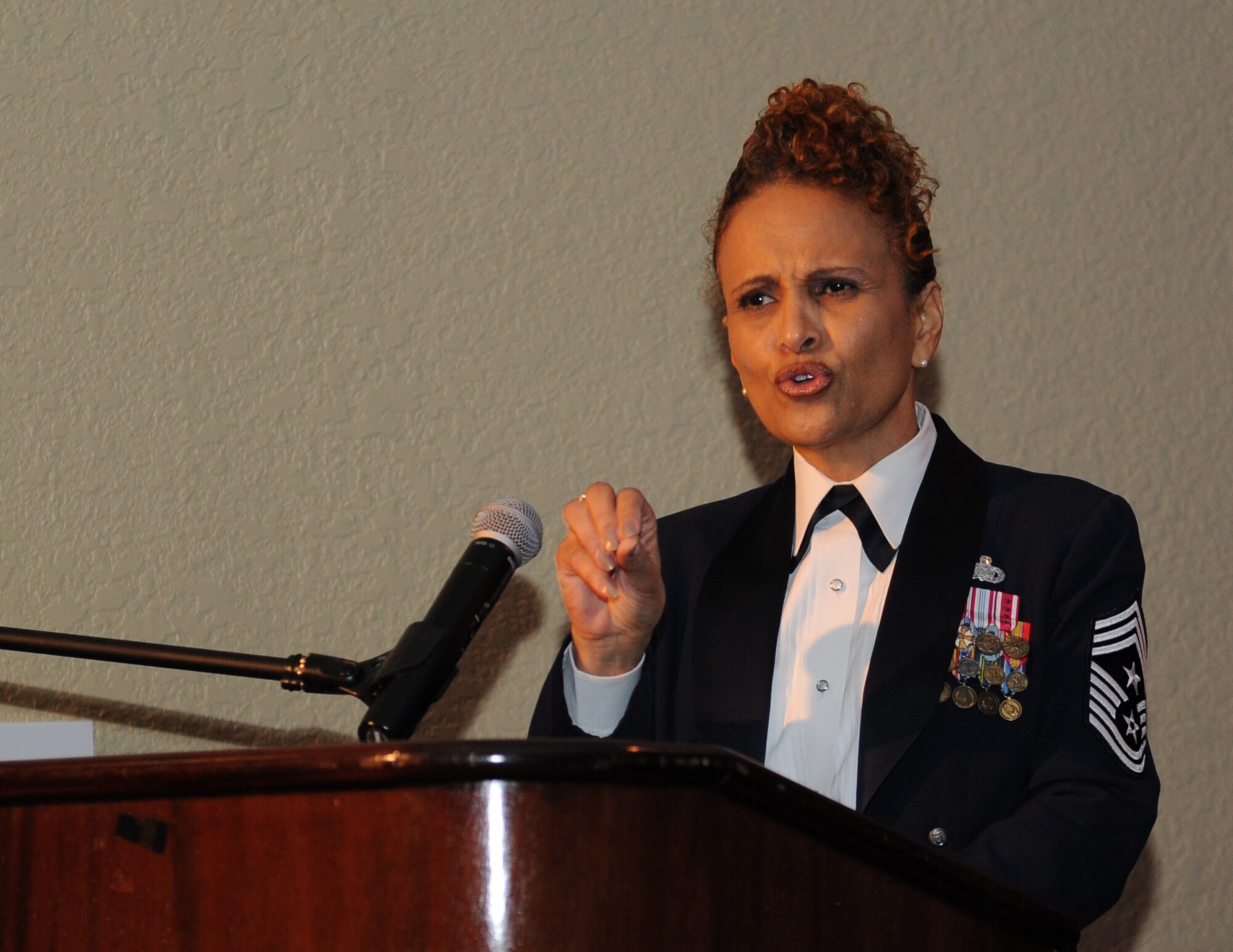 Retired Chief Master Sgt. Aliquippa Allen delivers comments as the guest speaker during the 2015 Keesler Annual Awards Banquet at the Bay Breeze Event Center Jan. 20, 2016, Keesler Air Force Base, Miss. The ceremony recognized outstanding Airmen and civilians in 14 categories for their accomplishments throughout 2015. The theme for the event was “ordinary people doing extraordinary things.” (U.S. Air Force photo by Kemberly Groue)