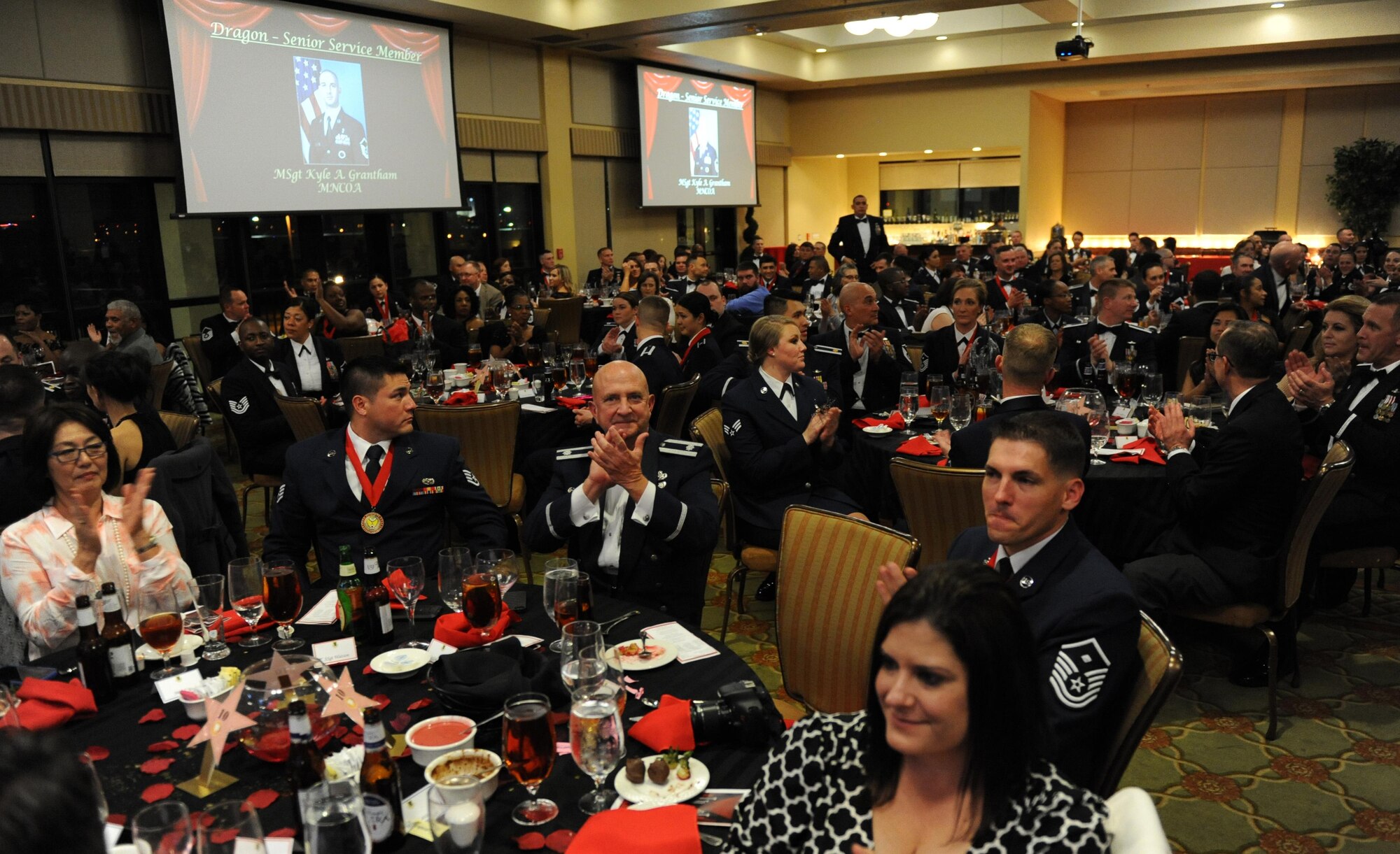 Keesler personnel applaud as nominees are recognized during the 2015 Keesler Annual Awards Banquet at the Bay Breeze Event Center Jan. 20, 2016, Keesler Air Force Base, Miss. The ceremony recognized outstanding Airmen and civilians in 14 categories for their accomplishments throughout 2015. The theme for the event was “ordinary people doing extraordinary things.” (U.S. Air Force photo by Kemberly Groue)