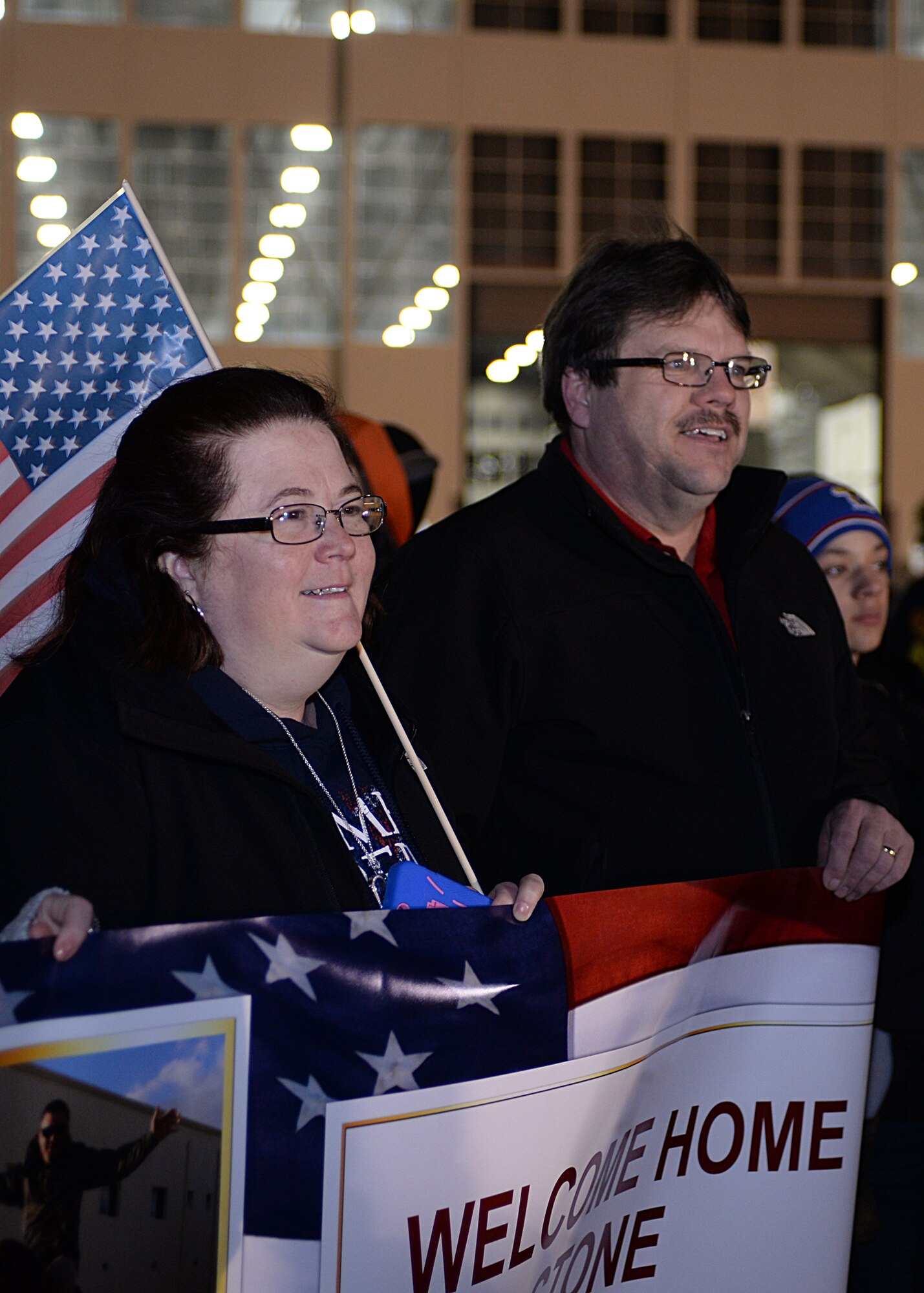 Teri, left, and Cecil, mother and father of Senior Airman Cecil Jr., 28th Aircraft Maintenance Squadron munitions technician, wait for their son to return from a deployment to Southwest Asia at Ellsworth Air Force Base, S.D., Jan. 24, 2016. More than 350 Airmen returned from supporting Operation Freedom’s Sentinel and Operation Inherent Resolve and were welcomed home by friends and family. (U.S. Air Force photo by Airman Sadie Colbert/Released)