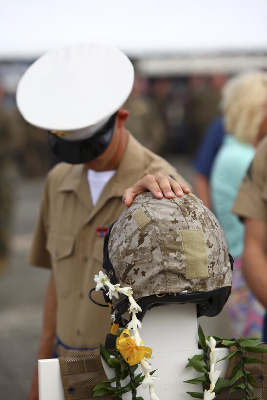 U.S. Marines honor the lives of the 12 fallen Marines of Marine Heavy Helicopter Squadron 463 during a memorial service on Marine Corps Base Hawaii, Jan. 22, 2016. Twelve U.S. Marines died when their two CH-53E Super Stallion helicopters were involved in an incident off the coast of Oahu's Waimea Bay along the North Shore the evening of Jan. 14. 