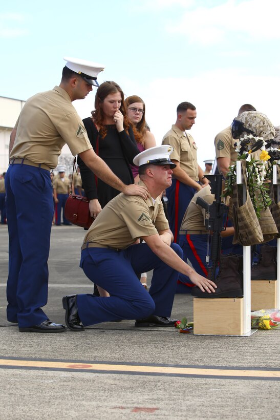 U.S. Marines honor the lives of the 12 fallen Marines of Marine Heavy Helicopter Squadron 463 during a memorial service on Marine Corps Base Hawaii, Jan. 22, 2016. Twelve U.S. Marines died when their two CH-53E Super Stallion helicopters were involved in an incident off the coast of Oahu's Waimea Bay along the North Shore the evening of Jan. 14.
