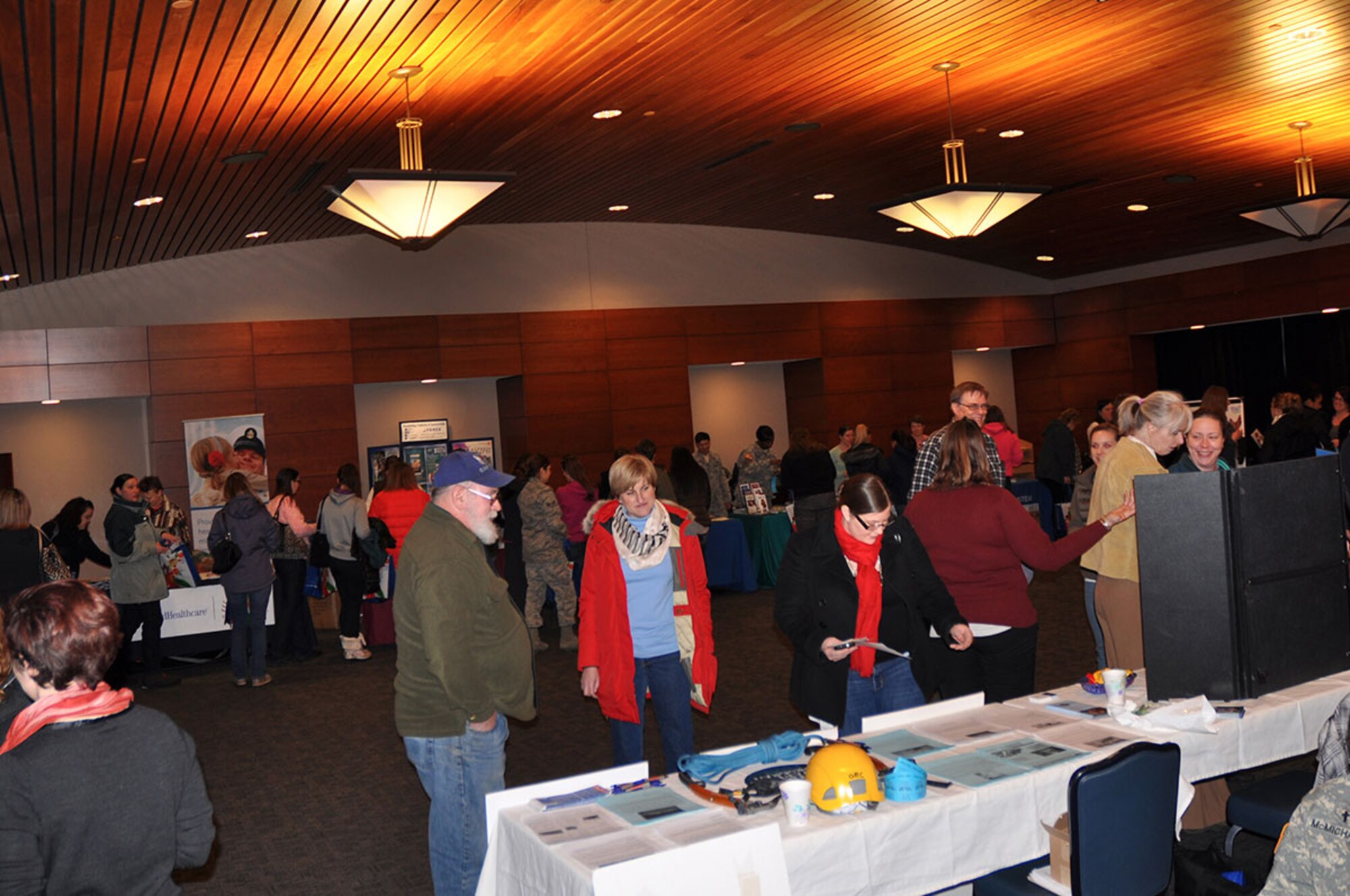 Women of Joint Base Elmendorf-Richardson receive health information from different organizations during the 2015 “Girls’ Night Out” event. This year’s event will be held at the Arctic Warrior Events Center, Feb. 2, from 4:30-8 p.m. (Courtesy photo)