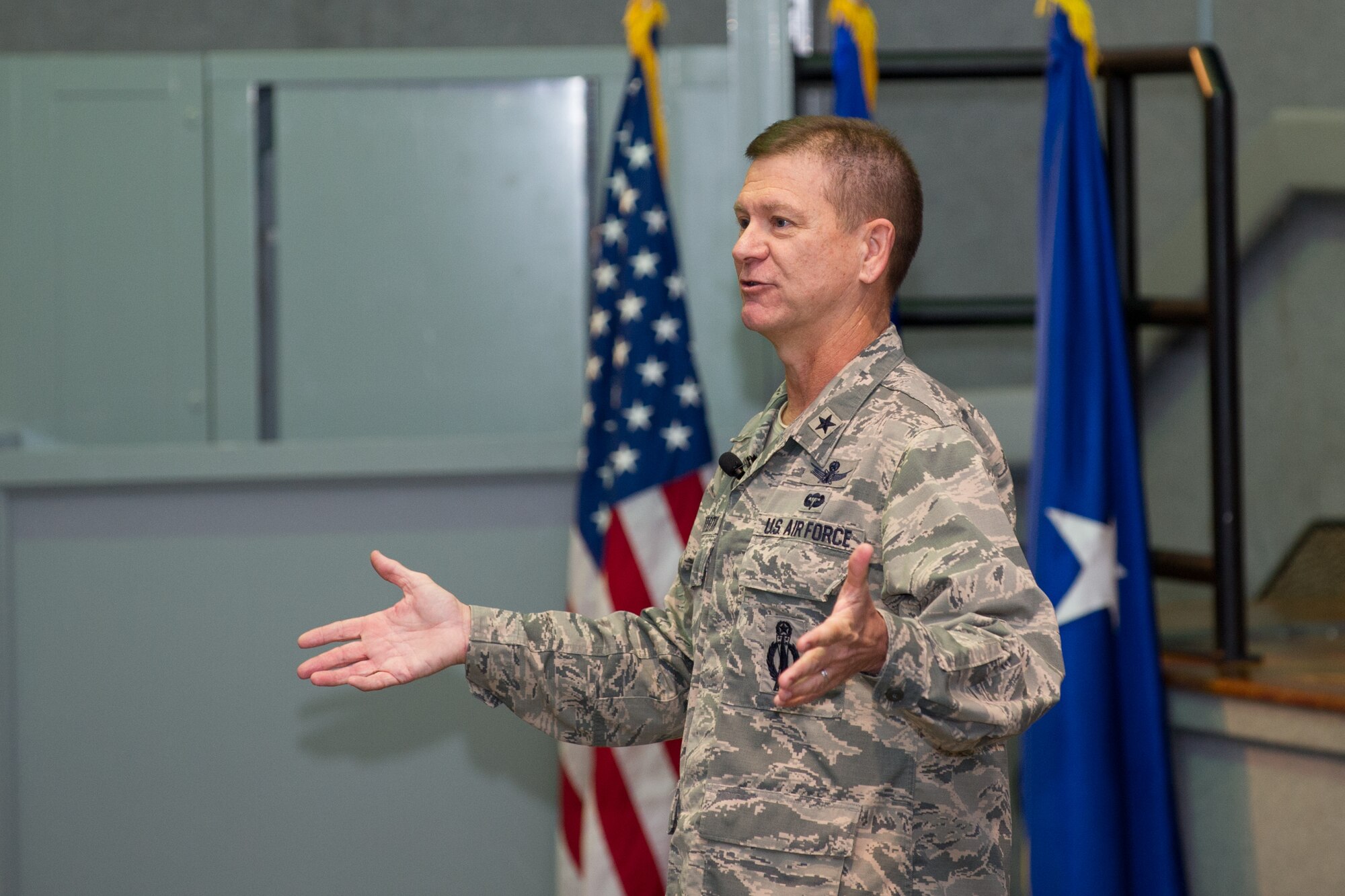 Brig Gen Monteith, 45th Space Wing commander, speaks the audience at an All-Call for base personnel Jan. 4 at the Patrick Air Force Base Theater. The general rang in the new year with the crowd by reviewing the highlights of the previous year, reporting the successful results of an Air Force Space Command Inspector General Unit Effectiveness Inspection and addressing the future expectations for 2016. (U.S. Air Force photo by Benjamin Thacker) (Released)
