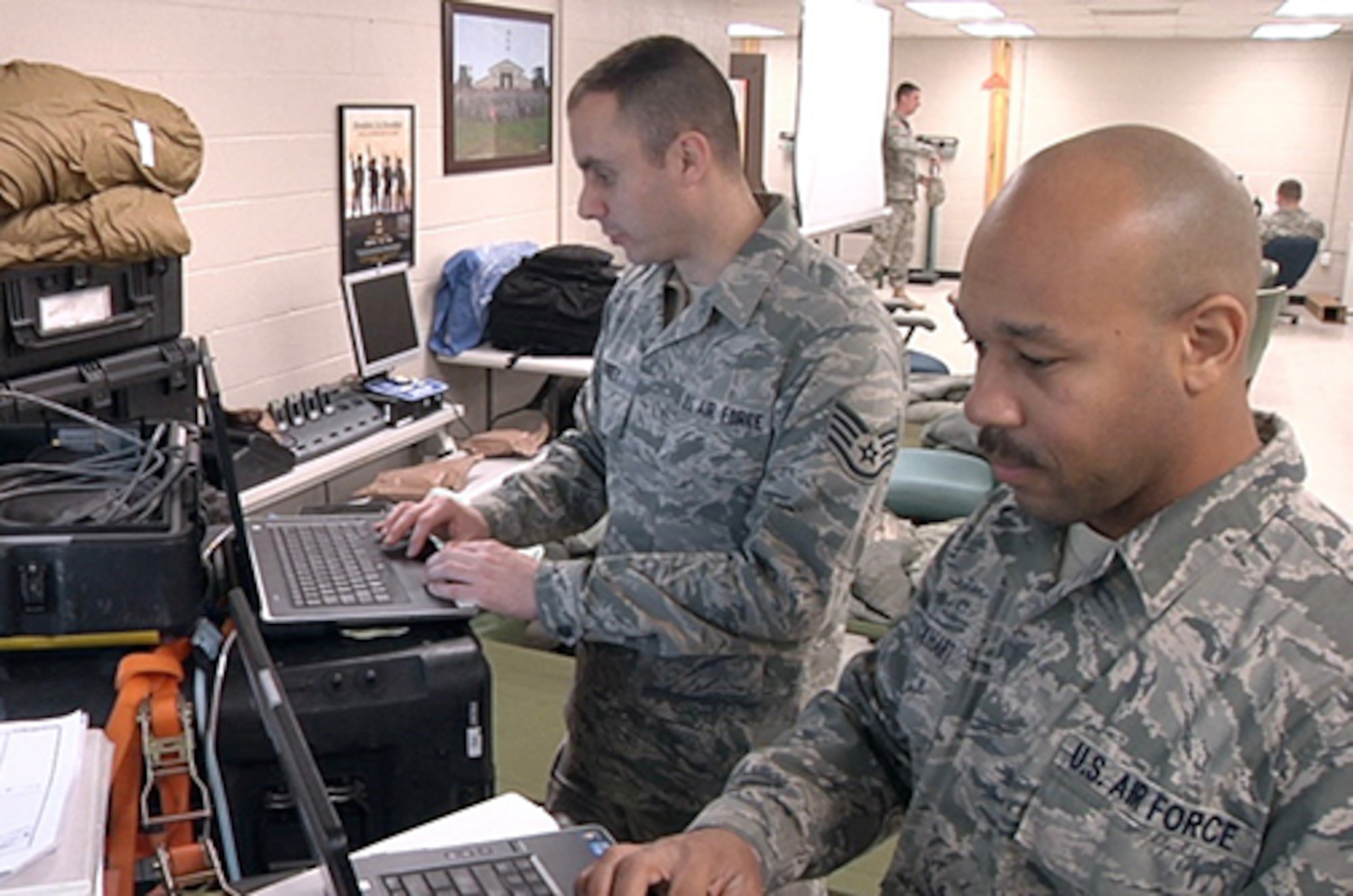 Citizen Airmen of the 239th Combat Communication Squadron set up, operate and maintain the Joint Task Force Headquarters Joint Incident Site Communication Capability, or JISCC system, providing satellite-based telephone, network and email capability to the Festus, Missouri based operation, January 6, 2016.  (Courtesy Photo)  