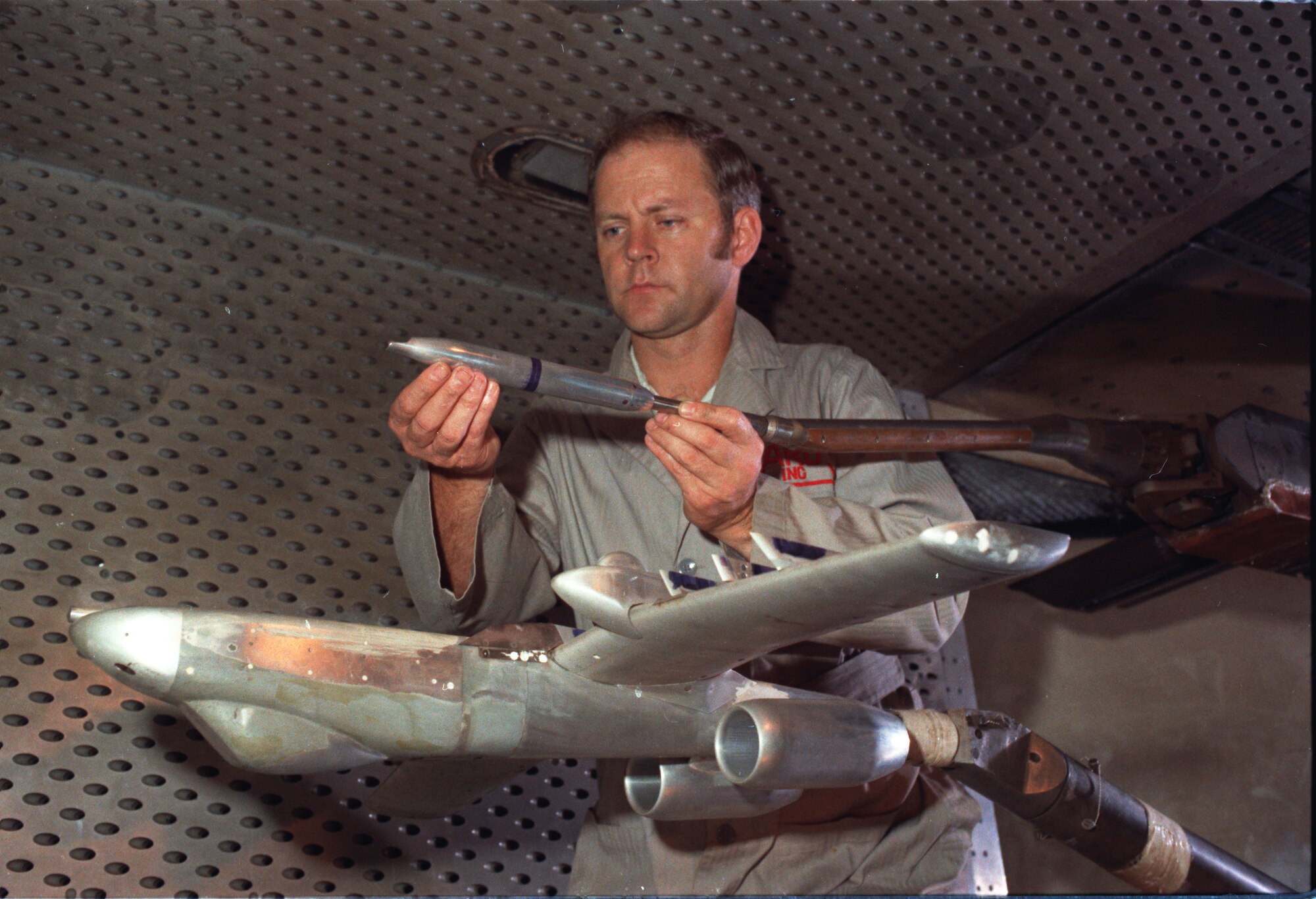 This photo from 1973 shows A-10 stores being prepped for testing in the 4-foot transonic wind tunnel at AEDC. (AEDC Photo)