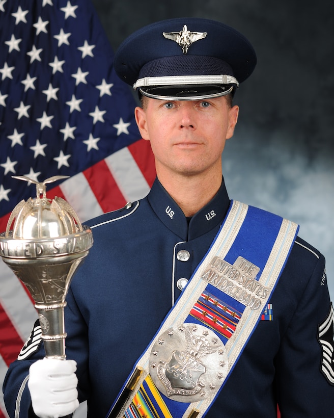 An Air Force drum major poses for an official portrait.