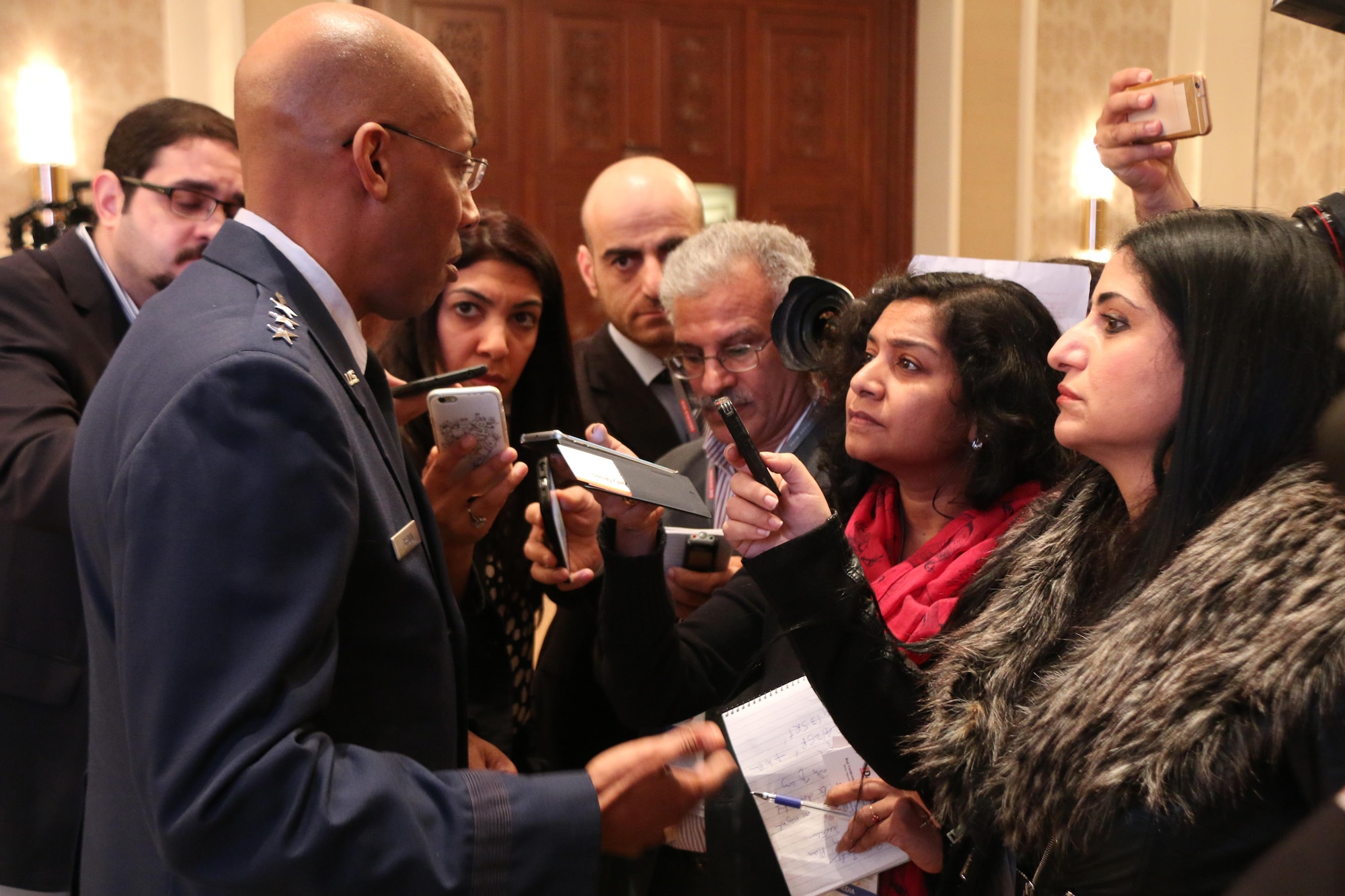 Lt. Gen. Charles Q. Brown Jr., commander, U.S. Air Forces Central Command, meets reporters following the Manama Air Power Symposium which was convened the day before the Bahrain International Airshow. The Bahrain International Airshow is a biennial aviation and aerospace industry event. U.S. military support and participation continues to build interoperability and highlight a shared commitment to regional security and stability. (U.S. Navy photo by Lt. Alex Cornell du Houx)