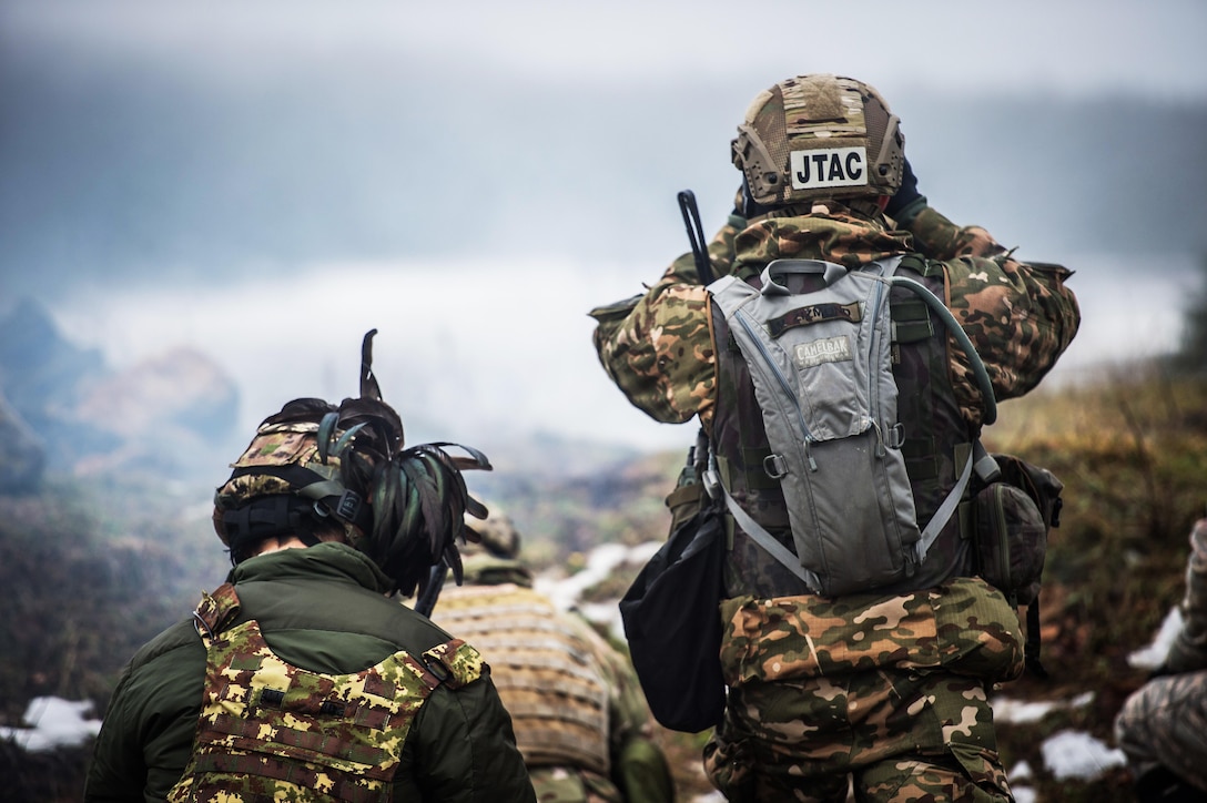 Slovenian and Italian soldiers train with U.S. Air Force Joint Terminal Attack Controllers assigned to the Joint Multinational Readiness Center’s Bullseye Observer Coach Trainer Team during exercise Allied Spirit IV in the Hohenfels training area, Germany, Jan. 25, 2016. U.S. Army photo by Sgt. 1st Class Caleb Barrieau