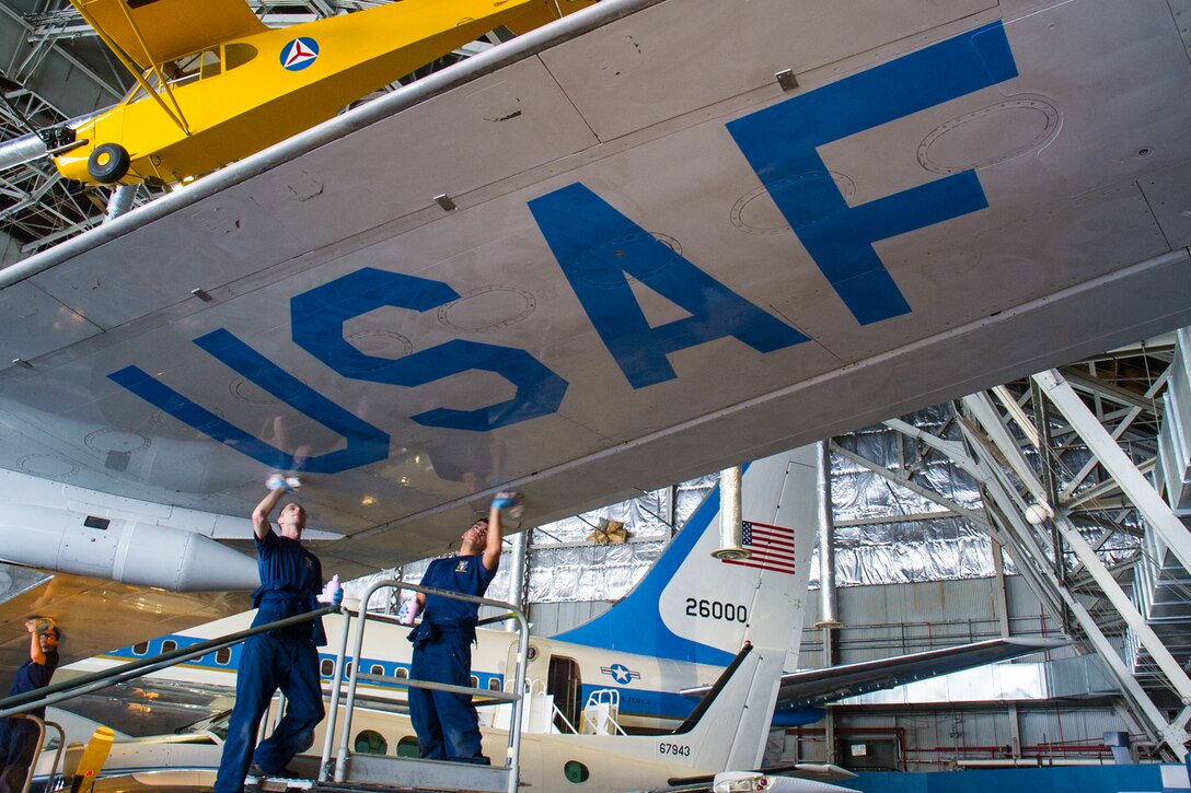 Members of the 89th Airlift Wing from Joint Base Andrews clean and polish historic presidential aircraft in the museum's collection on January 13-15, 2016. The work is being done in preparation for the aircraft to move to the museum's new fourth building, which opens June 8th. (Air Force photo by Ken LaRock)