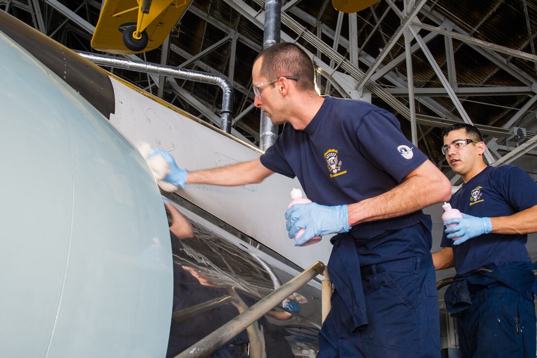 Members of the 89th Airlift Wing from Joint Base Andrews clean and polish historic presidential aircraft in the museum's collection on January 13-15, 2016. The work is being done in preparation for the aircraft to move to the museum's new fourth building, which opens June 8th. (Air Force photo by Ken LaRock)