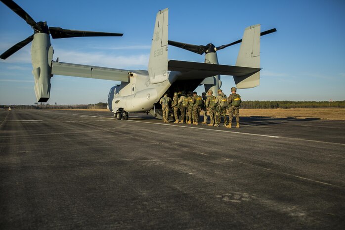 Marines with U.S. Marine Corps Forces, Special Operations
Command board an MV-22B Osprey to conduct parachute operations with Marine Medium Tiltrotor Squadron 365 at Marine Corps Air Station New River, N.C., Jan. 21, 2016. The squadron supported Marine Raiders by conducting high altitude low opening jumps as well as static line jumps to allow Marine Raiders to train for future operations. (U.S. Marine Corps photo by Lance Cpl. Luke Hoogendam/Released)
