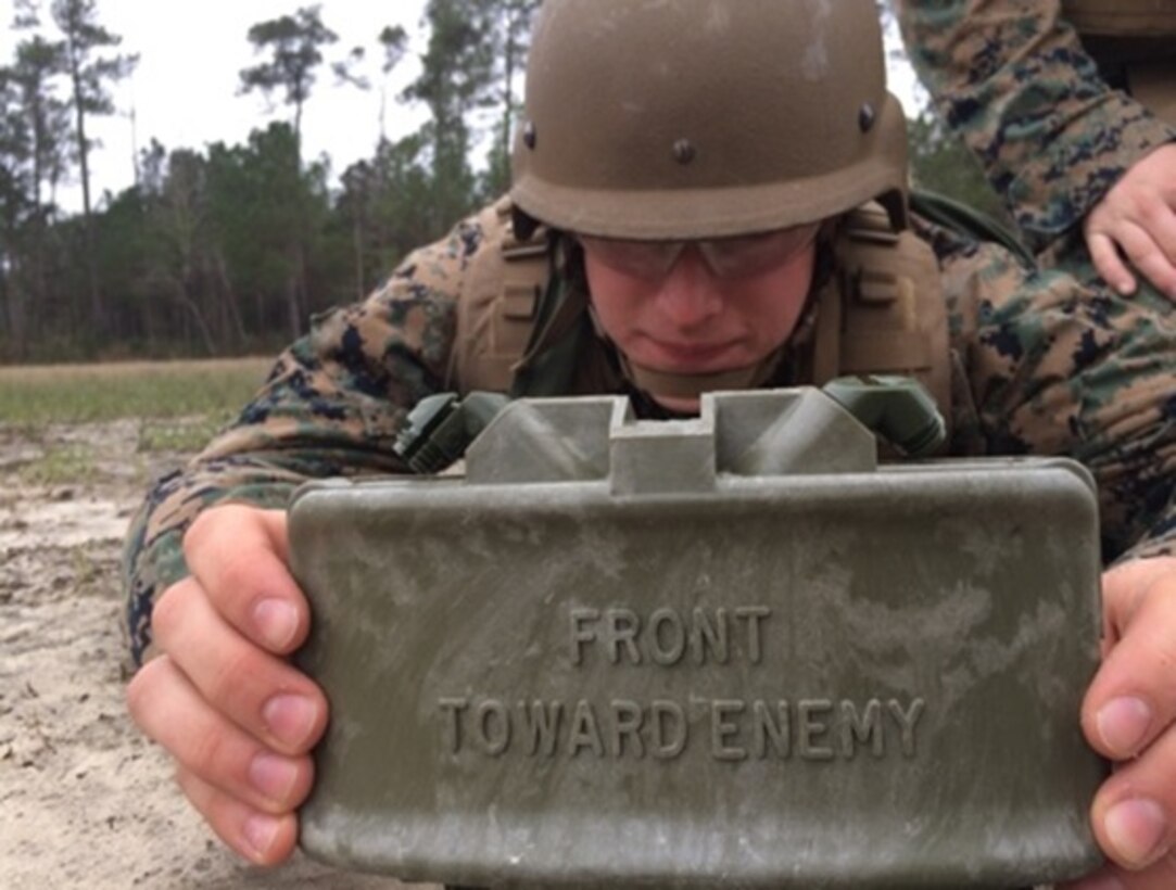 Private First Class David D. Schaefer, a Marine attached to Basic Combat Engineer course 6-16 (BCE 6-16); conducts a practical application on claymore mine employment at Marine Corps Engineer School, Camp Lejeune, N.C. 
