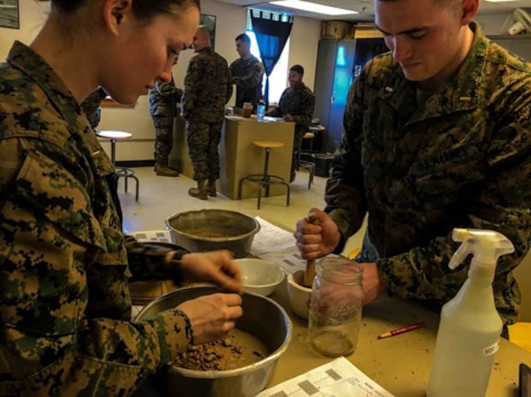 On 5 January 2016, Second Lieutenants Morgan Oswald and Andrew McDougall, Marines attached to Combat Engineer Officers course 3-16 (CEO 3-16); preform the wire diagram method for soil classification. This is a process that identifies and classifies a given soil type which assists in selecting the correct location for an engineer project or for identifying specific needs in support of a project. 

