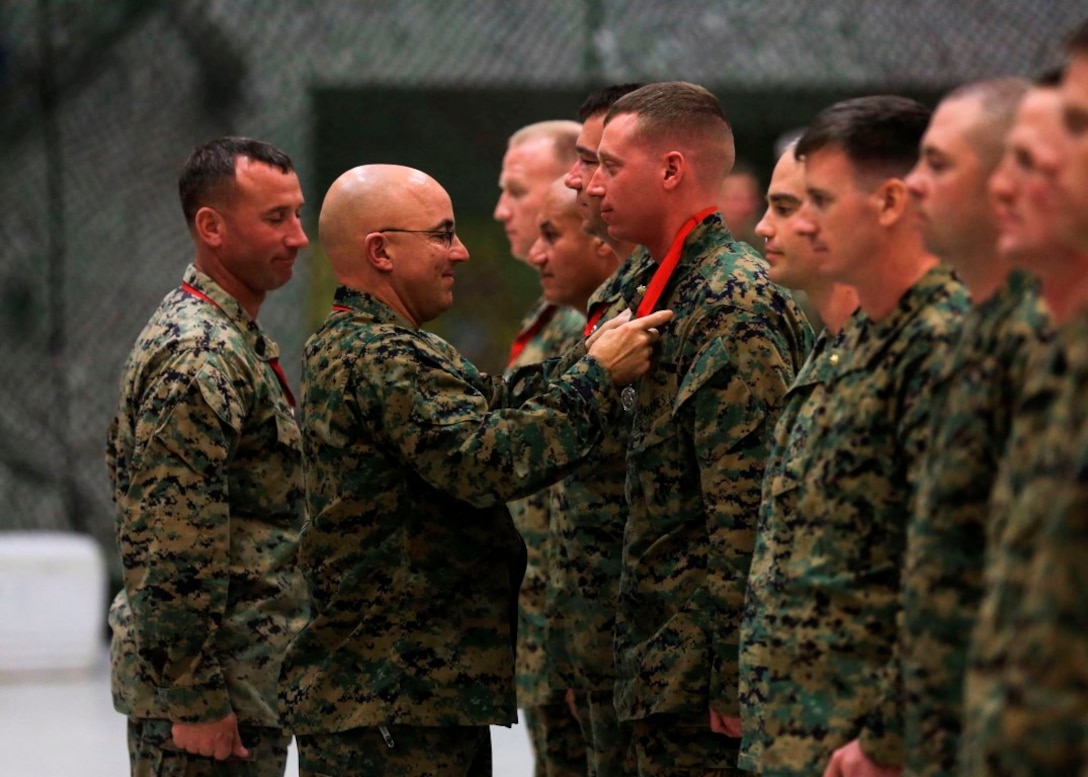 The Marines of 11th Marine Regiment celebrate Saint Barbara's Day--the patron saint of Artillery--in Las Pulgas, Camp Pendleton, Calif., Jan. 21, 2016. The regiment remembered those artillerymen who have gone before them with a memorial service, inducted new members into the Honorable Order of Saint Barbara, and added some levity with a homemade trebuchet competition. (Marine Corps photo by Lance Cpl. Devan K. Gowans/Released)
