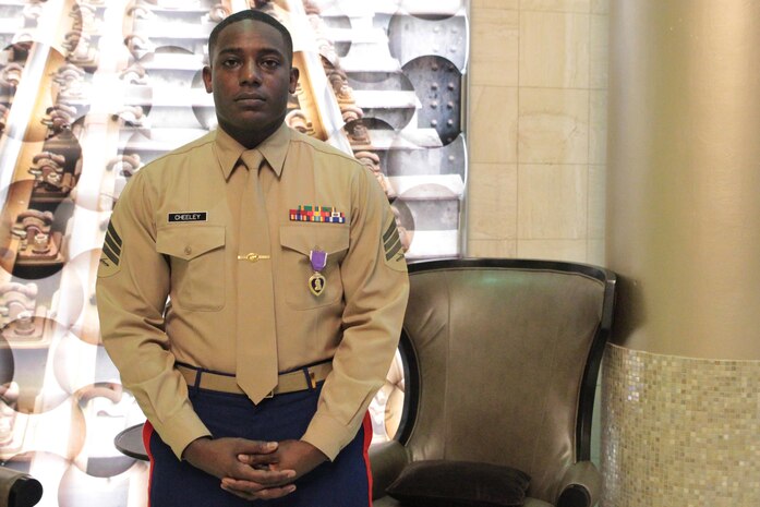 Sgt. DeMonte R. Cheeley stands for a photo after receiving the Purple Heart medal Jan. 26, 2016, at a ceremony in Chattanooga, Tenn. Cheeley received the Purple Heart for injuries he sustained during a July 16, 2015 attack in Chattanooga at the Armed Forces Career Center where he works. An investigation conducted by the FBI and the Naval Criminal Investigative Service determined the attack had been inspired by a foreign terrorist group making Cheeley eligible for the Purple Heart. Cheeley is a Marine recruiter with Recruiting Substation Chattanooga, Recruiting Station Nashville, Tenn. (Official Marine Corps photo by Cpl. Diamond N. Peden/Released)