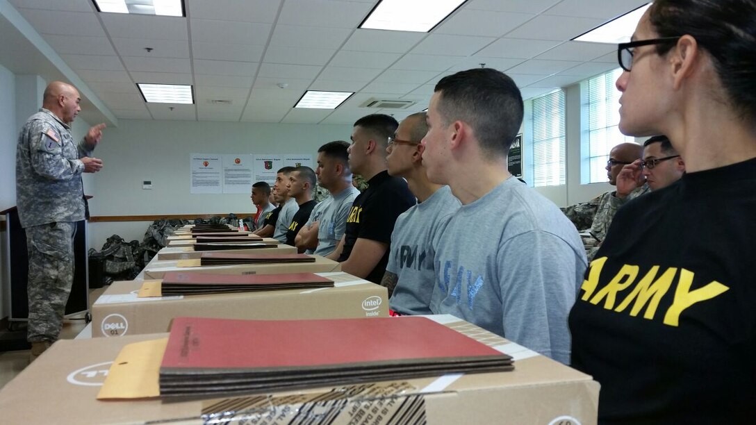 1st Sgt. Daniel Cuevas from the 1/389th Regiment (Drill Sergeant) explains some administrative notes to the competitors before the start of the 77th Combat Sustainment Battalion (CSSB)Best Warrior Competition held 22-24 January at Ramey Base, Aguadilla, Puerto Rico