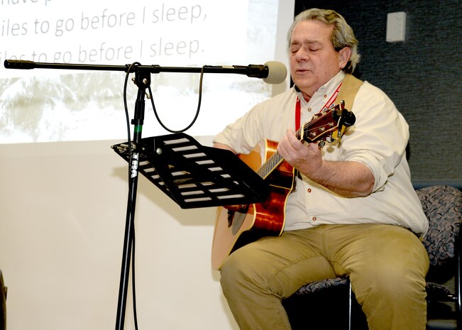 Benny Pitsinger, Huntsville Center Engineering Directorate, plays a song he wrote for the Dr. Martin Luther King Jr. Unity Day Celebration called "The Hyphenated American."