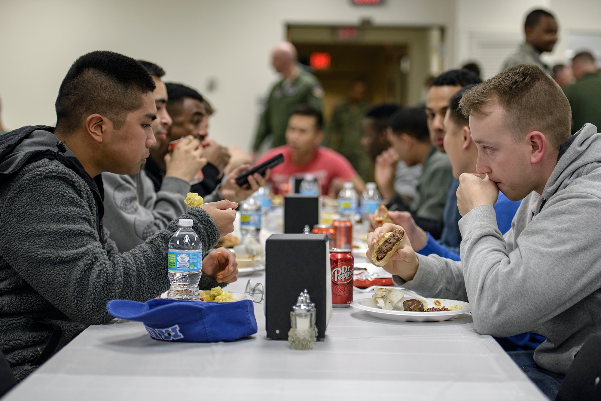 Airmen packed the Community Chapel Activity Center for January's SIGMO at Vance Air Force Base, Oklahoma, Jan. 25. The 71st Force Support Squadron, with help from volunteers from across the base, hosted the monthly community meal held for single and accompanied Airmen. (U.S. Air Force photo / David Poe)
