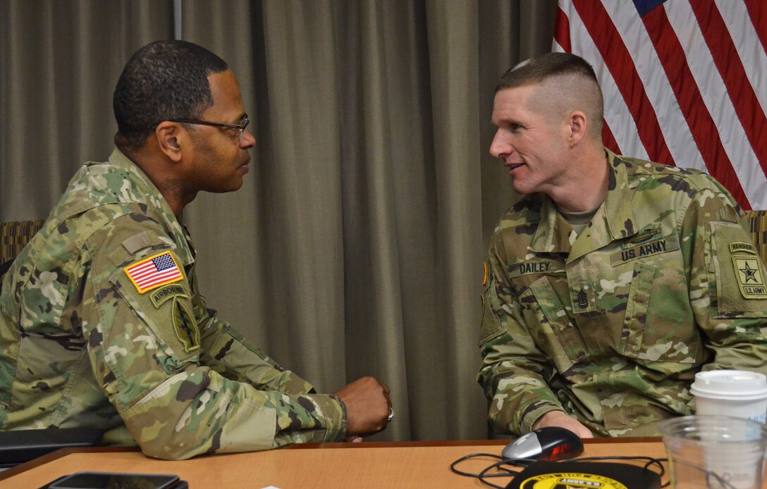 Sgt. Maj. of the Army Daniel Dailey talks with Command Sgt. Maj. James Sims, Command Sgt. Maj. of the U.S. Army Material Command, during a Senior Enlisted Council held at the U.S. Army Human Resources Command, Jan. 20, 2016. The SEC meets quarterly to discuss issues that affect the welfare of Soldiers.  (U.S. Army photo by Sgt. 1st Class Joy Dulen)