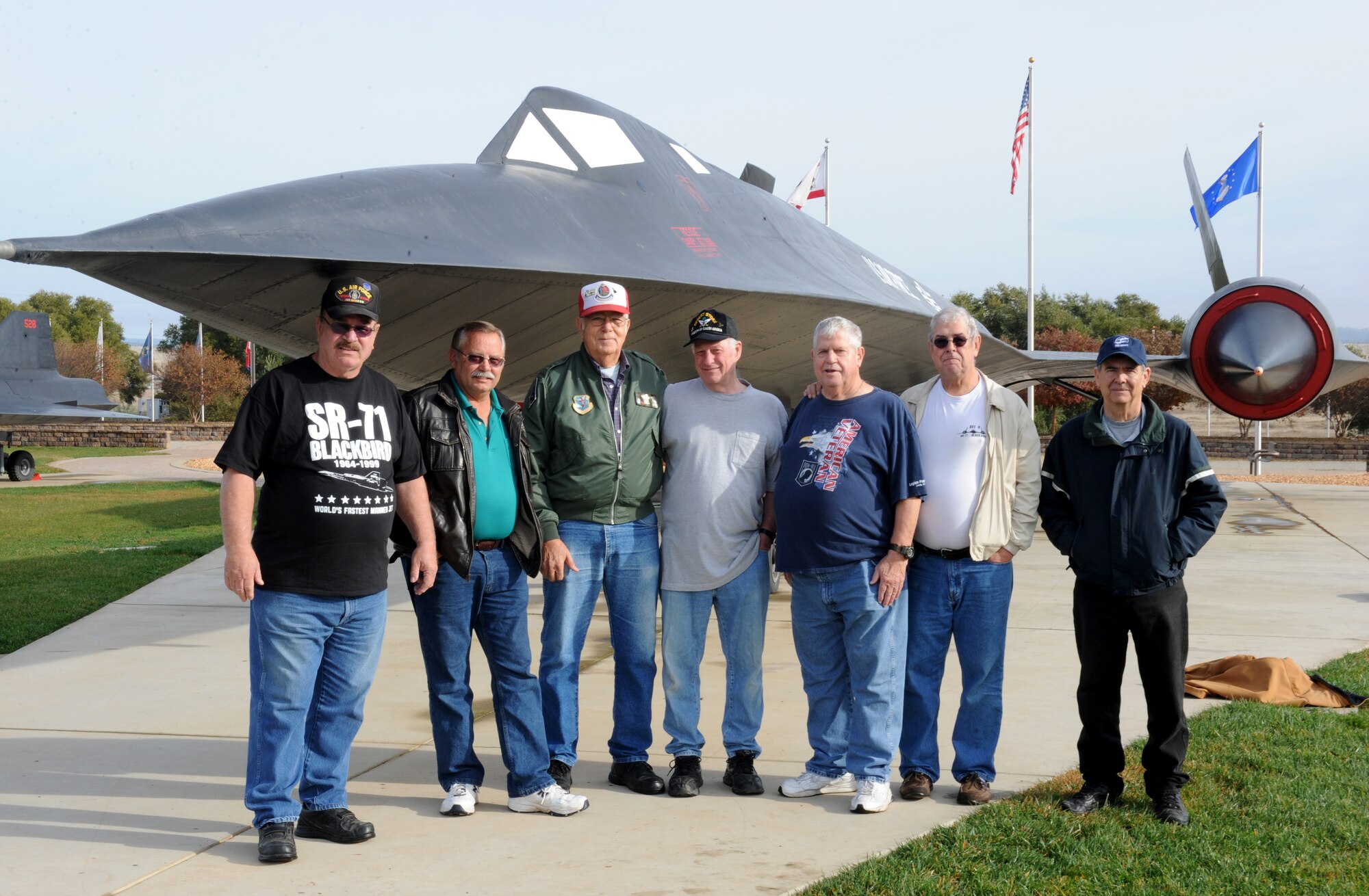 Members of the local Blackbird Maintainers group pose for a picture at Beale Air Force Base, California, Dec. 08, 2015. The group is comprised of former Blackbird maintainers and personnel that contributed to the SR-71 program. (U.S. Air Force photo by Staff Sgt. Robert M. Trujillo)