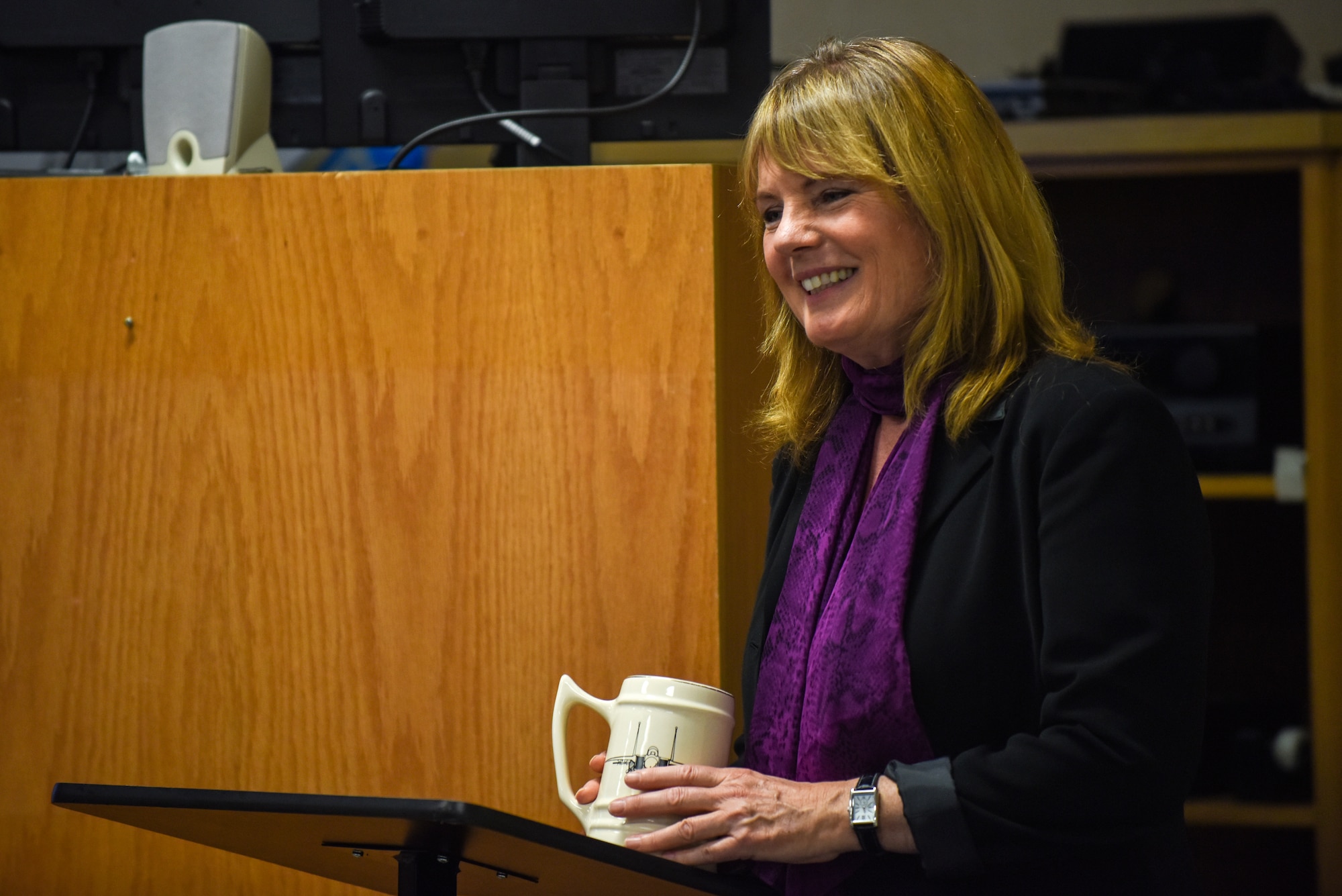 Christina Olds, daughter of late Brig. Gen. Robin Olds, answers questions after speaking about her father’s Air Force legacy, Jan. 22, 2016, at Seymour Johnson Air Force Base, North Carolina. Olds told stories of her father’s career as well as childhood memories of time spent with him. (U.S. Air Force photo/Airman Shawna L. Keyes)