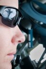 A refueling 113th Wing D.C. Air National Guard F-16 Fighting Falcon is seen reflected in the sunglasses of a 756th Air Refueling Squadron boom operator during exercise Creole Archer in Louisiana Jan. 22, 2016. Several units with the 459th Air Refueling Wing participated in Creole Archer to support fighter aircraft training as well as conduct their own refueling, medical, maintenance, intelligence, support and aerial port training. (U.S. Air Force photo by Staff Sgt. Kat Justen)
