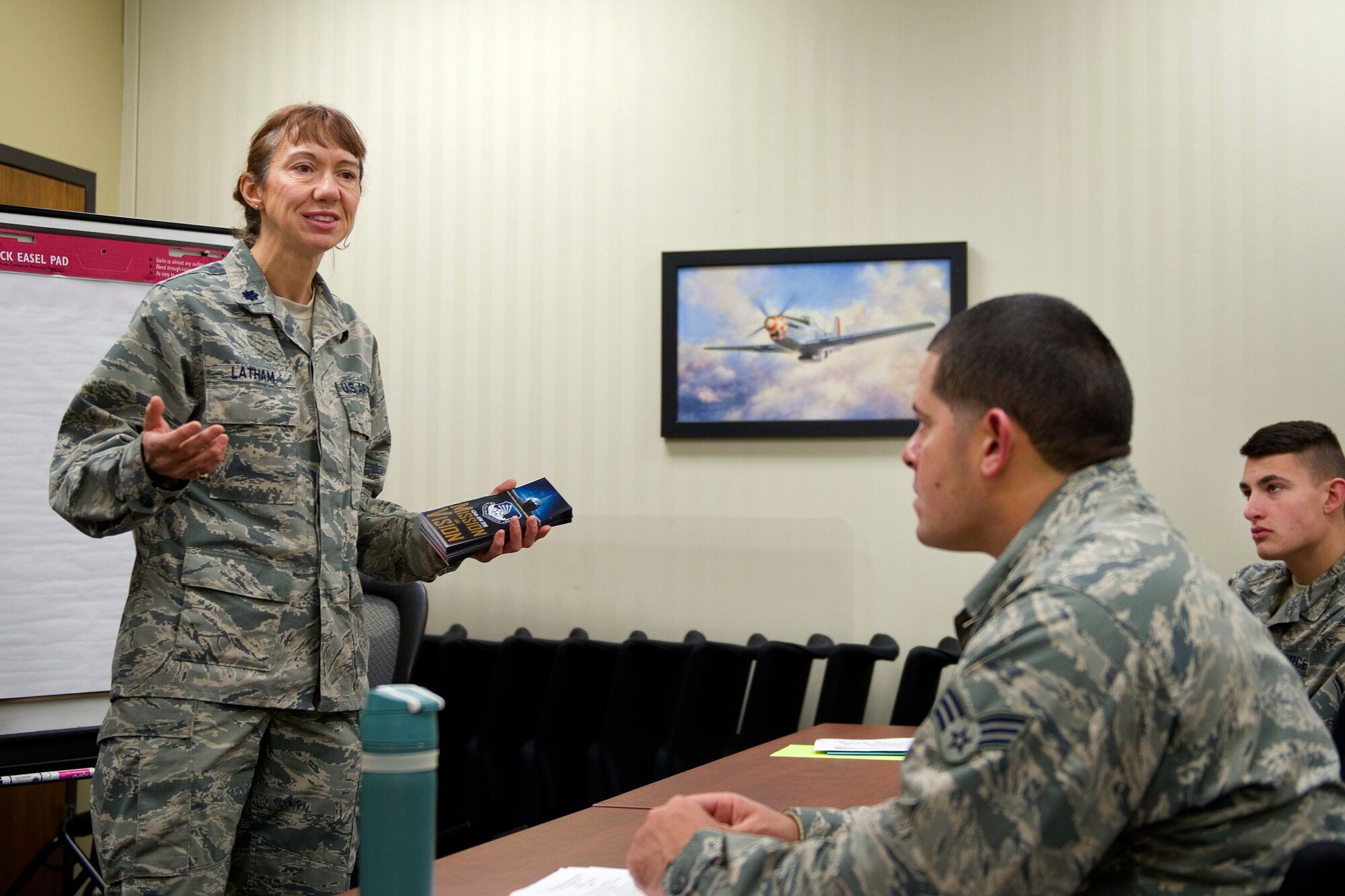 Lt. Col. Patricia Latham, 434th Air Refueling Wing process manager, speaks about the 434th Air Refueling Wing 2016 mission and vision during a newcomer's orientation at Grissom Air Reserve Base, Ind., Jan. 10, 2016. Latham is responsible for overseeing effective process improvement in an effort to ensure processes here are efficient, cost saving and compliant with Air Force instructions. (U.S. Air Force photo/Tech. Sgt. Benjamin Mota)
