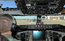 A 22nd Aircraft Maintenance Squadron crew chief marshals a KC-135 Stratotanker, Jan. 26, 2016, at McConnell Air Force Base, Kan. The aircraft was returning back to base after an aerial refueling training mission over Nebraska. (U.S. Air Force photo/Senior Airman David Bernal Del Agua)