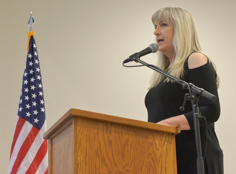 Stacey Lindbergh, Palmetto Scholar’s Academy chairman of the board, addresses the audience during the ribbon cutting ceremony at PSA’s new school building in Hunley Park at Joint Base Charleston, S.C., on Jan. 23, 2016. PSA was originally located on the Naval Weapons Station in a small daycare center. Lindbergh worked with Col. Richard McComb, former JB Charleston commander, to build the new facility. (U.S. Air Force photo/Airman 1st Class Thomas T. Charlton)