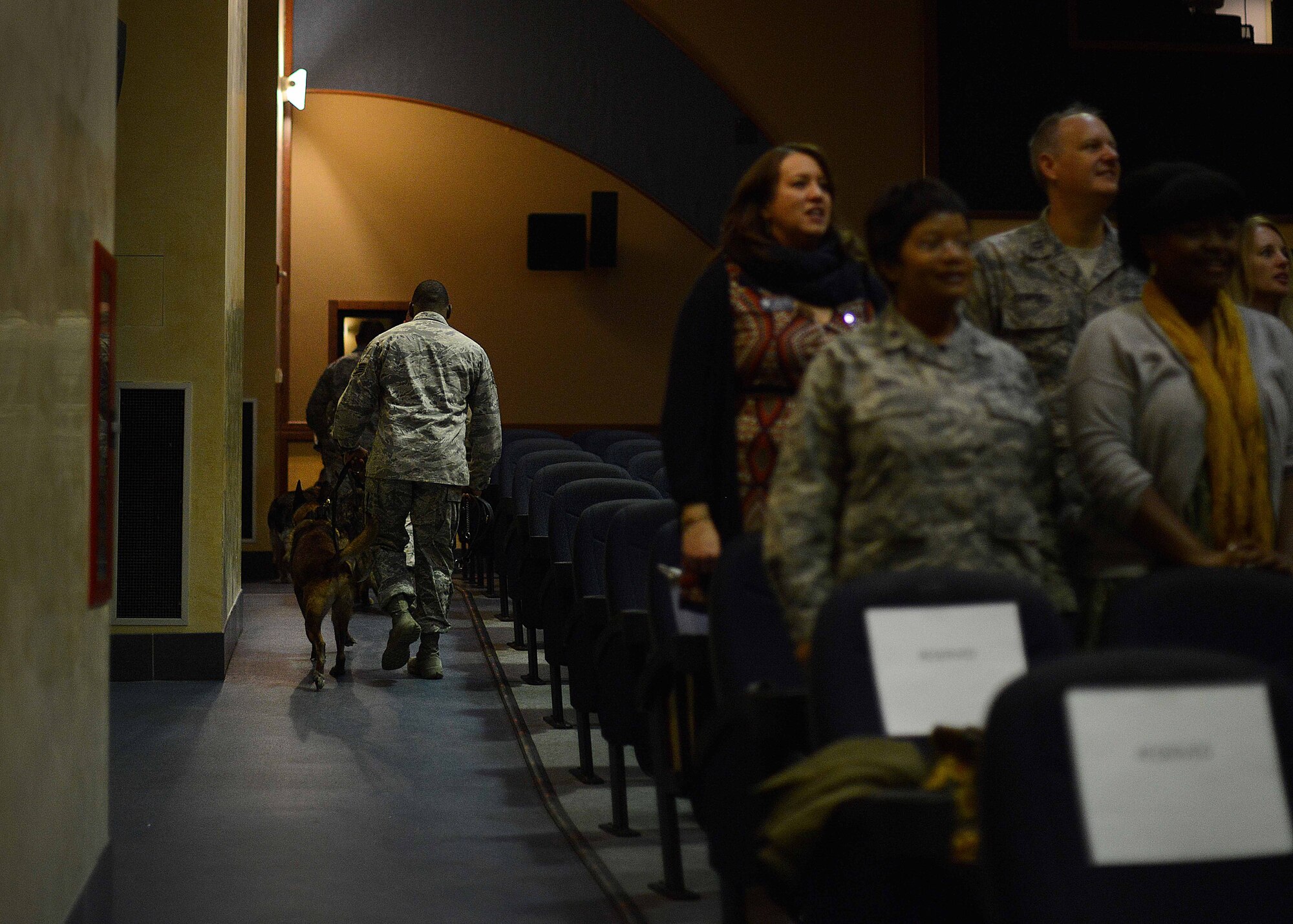 The 31st Security Forces Squadron held a military working dog retirement ceremony Jan. 22, 2016, at Aviano Air Base, Italy.  Soma, Treesje and Roki retired from service, received a certificate and were adopted into a new family. Department of Defense MWD’s are trained at Lackland Air Force Base in San Antonio, Texas. (U.S. Air Force by Staff Sgt. Evelyn Chavez)