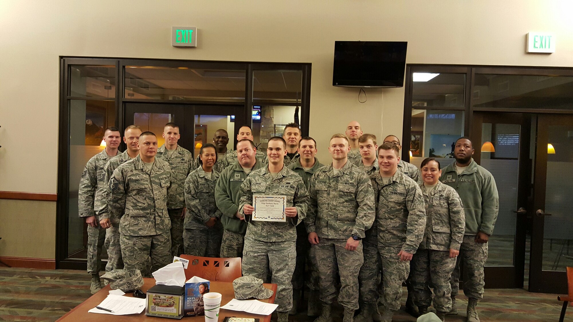 PETERSON AIR FORCE BASE, Colo. – Staff Sgt. Zachary Davis, 561st Network Operations Center directory services supervisor, was selected as the Diamond Council's Diamond Sharp Award winner for January 2016. The award was presented by Master Sgt. Roger A. Davila, president of the Peterson Diamond Council. (courtesy photo)