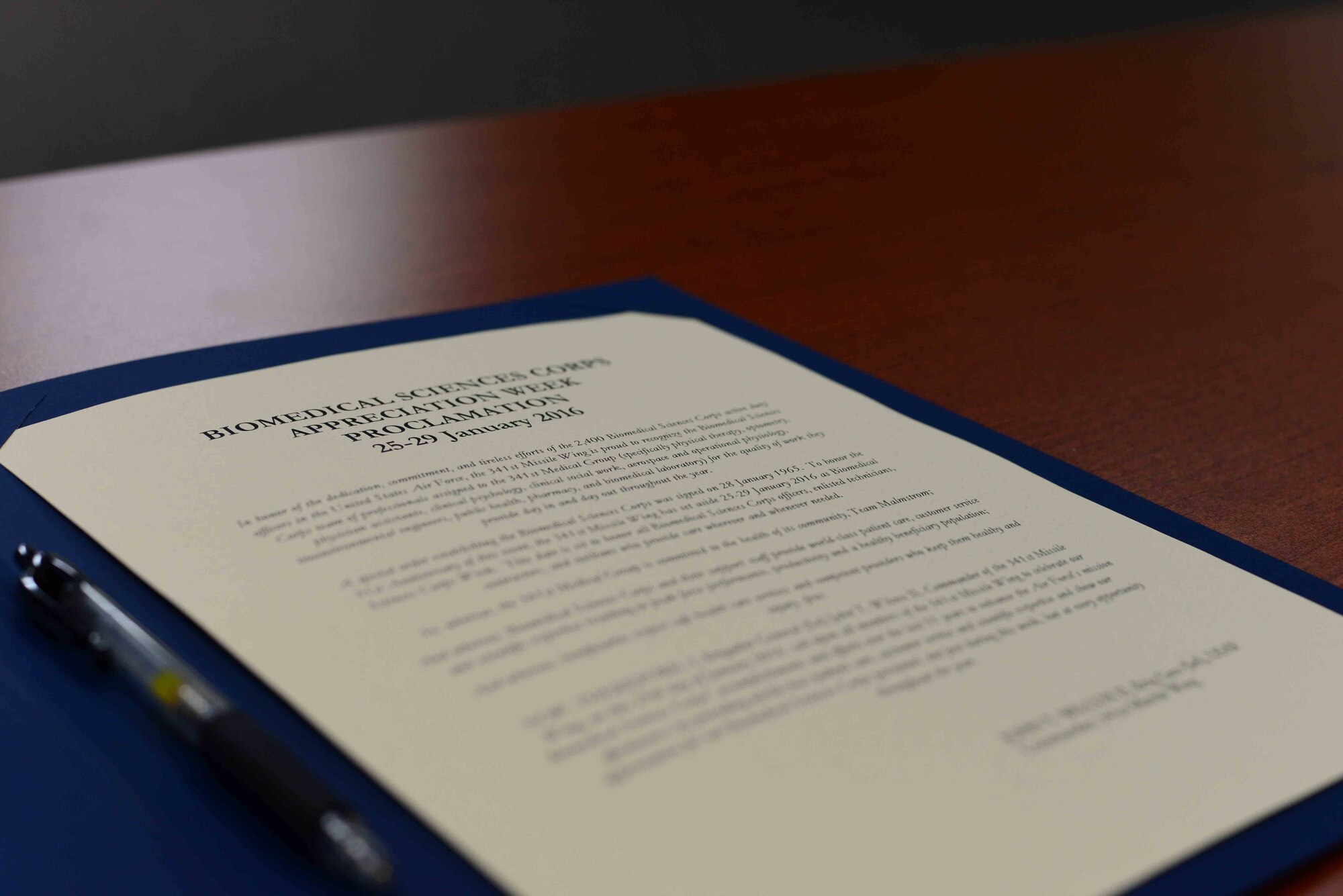 The Biomedical Sciences Corps Appreciation Week Proclamation for the 341st Medical Group waits to be signed by the 341st Missile Wing commander Jan. 25, 2016, at Malmstrom Air Force Base, Mont. The appreciation week is Jan. 25-29, 2016, and honors the dedication, commitment and efforts of Biomedical Sciences Corps Airmen in the Air Force. (U.S. Air Force photo/Airman 1st Class Magen M. Reeves)