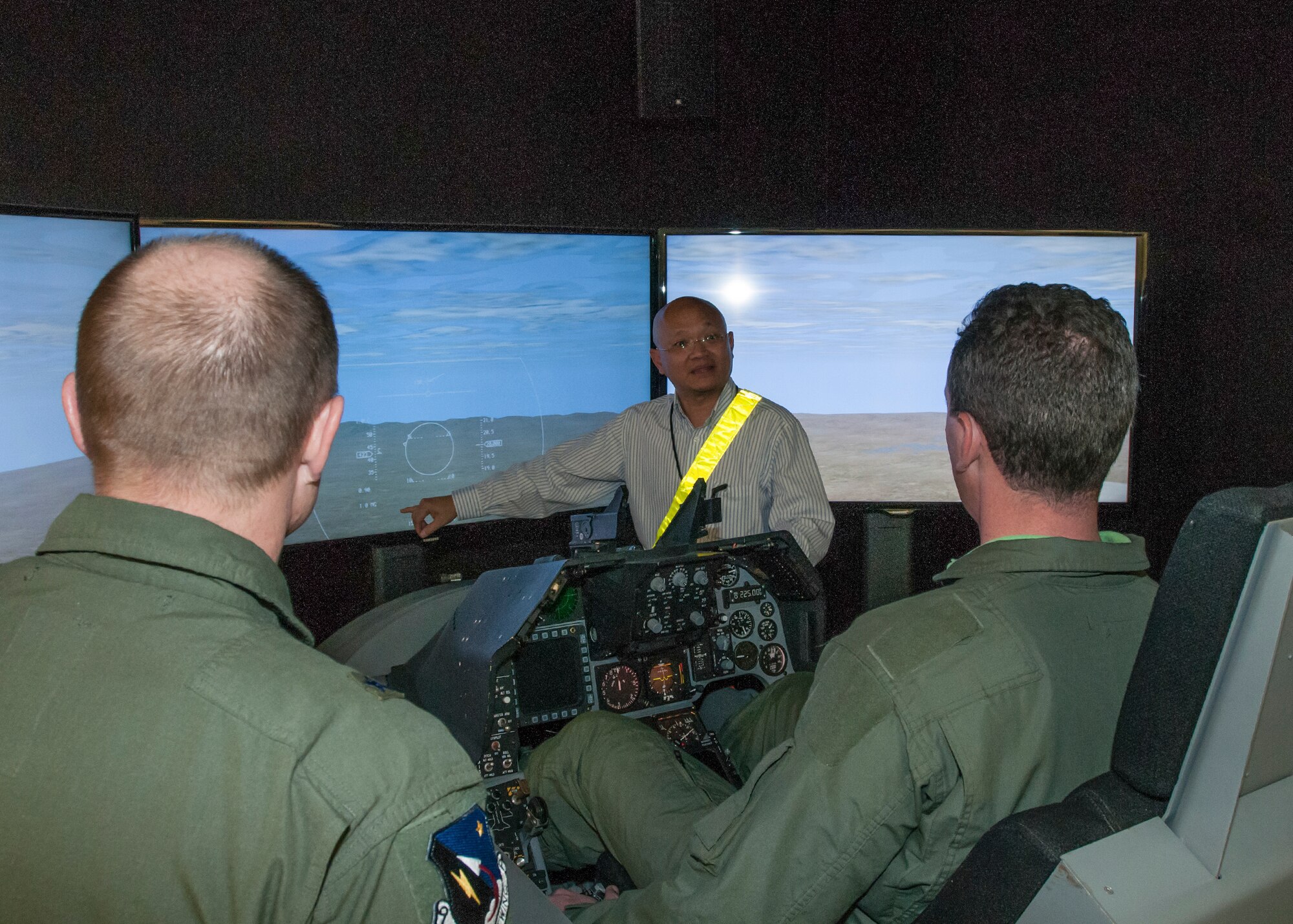 Tour attendees got the chance to try out simulators in the Integration Facility for Flight Avionics Systems Test (IFAST) during an honorary commanders tour Jan. 22. (U.S. Air Force photo by John Perry)