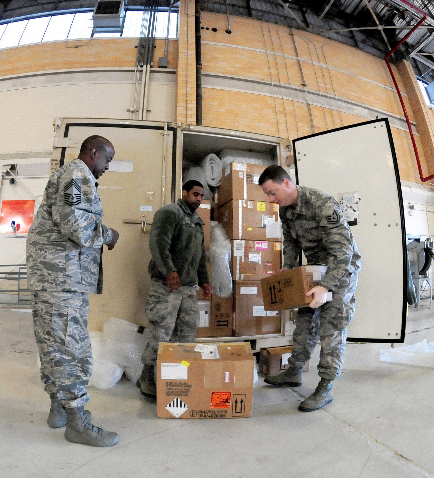 Chief Master Sgt. Darryl White, Senior Airman Marcus Hartley, and Tech. Sgt. Erin Yates, all from the 113th Logistics Readiness Squadron, Joint Base Andrews, Md., perform an inventory check at Naval Air Station Joint Reserve Base New Orleans, La., while deployed in support of Exercise Sentry Voodoo 2016. More than 200 D.C. Air National Guard Airmen are participating in the multiple unit/aircraft exercise. (Air National Guard photo by Master Sgt. Craig Clapper/Released)