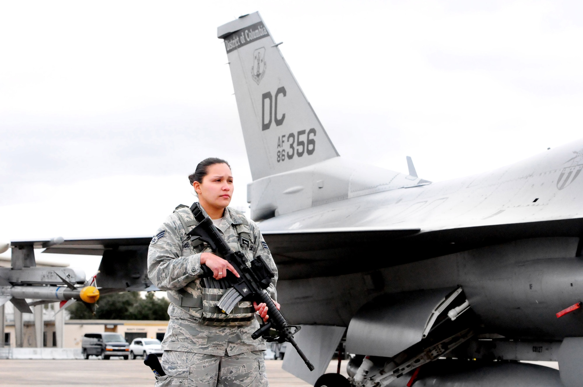 113th Wing security forces specialist Senior Airman Erica Gonzalez patrols the flight line on Naval Air Station Joint Reserve Base, New Orleans during Exercise Sentry Voodoo 2016. Gonzalez is a D.C. Air National Guardsman participating in the two-week flying exercise. (Air National Guard photo by Master Sgt. Craig Clapper/Released)