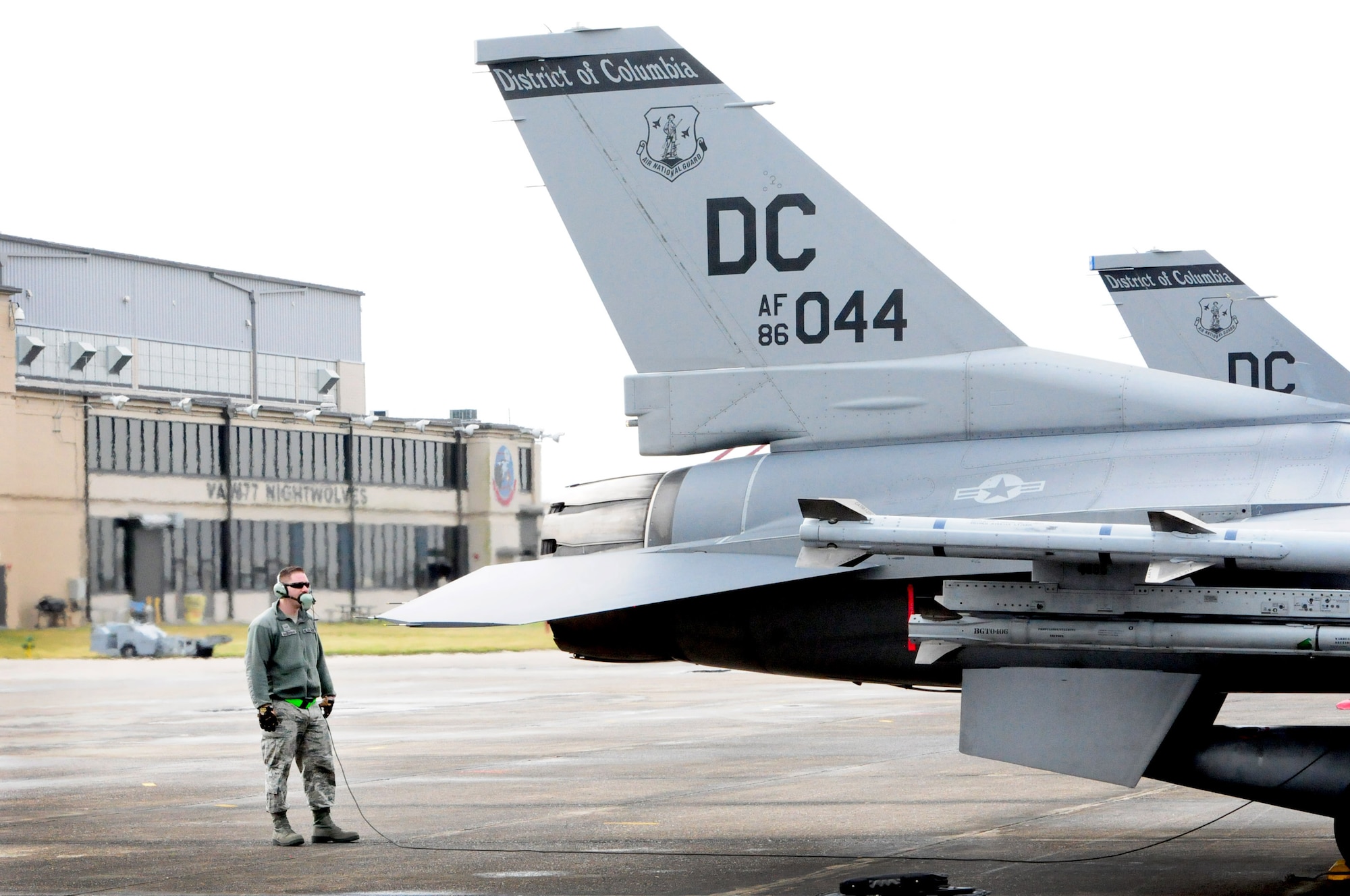 Staff Sgt. Samuel Baughman, crew chief, 113th Wing, Joint Base Andrews, Md., prepares an F-16 for a flying sortie at Naval Air Station Joint Reserve Base New Orleans, La., during Exercise Sentry Voodoo 2016. The D.C. Air National Guard Airmen are participating in the two-week flying exercise along with the 159th Fighter Wing, Louisiana Air National Guard, and the 459th Air Refueling Wing, Joint Base Andrews, Md. (Air National Guard photo by Master Sgt. Craig Clapper/Released)