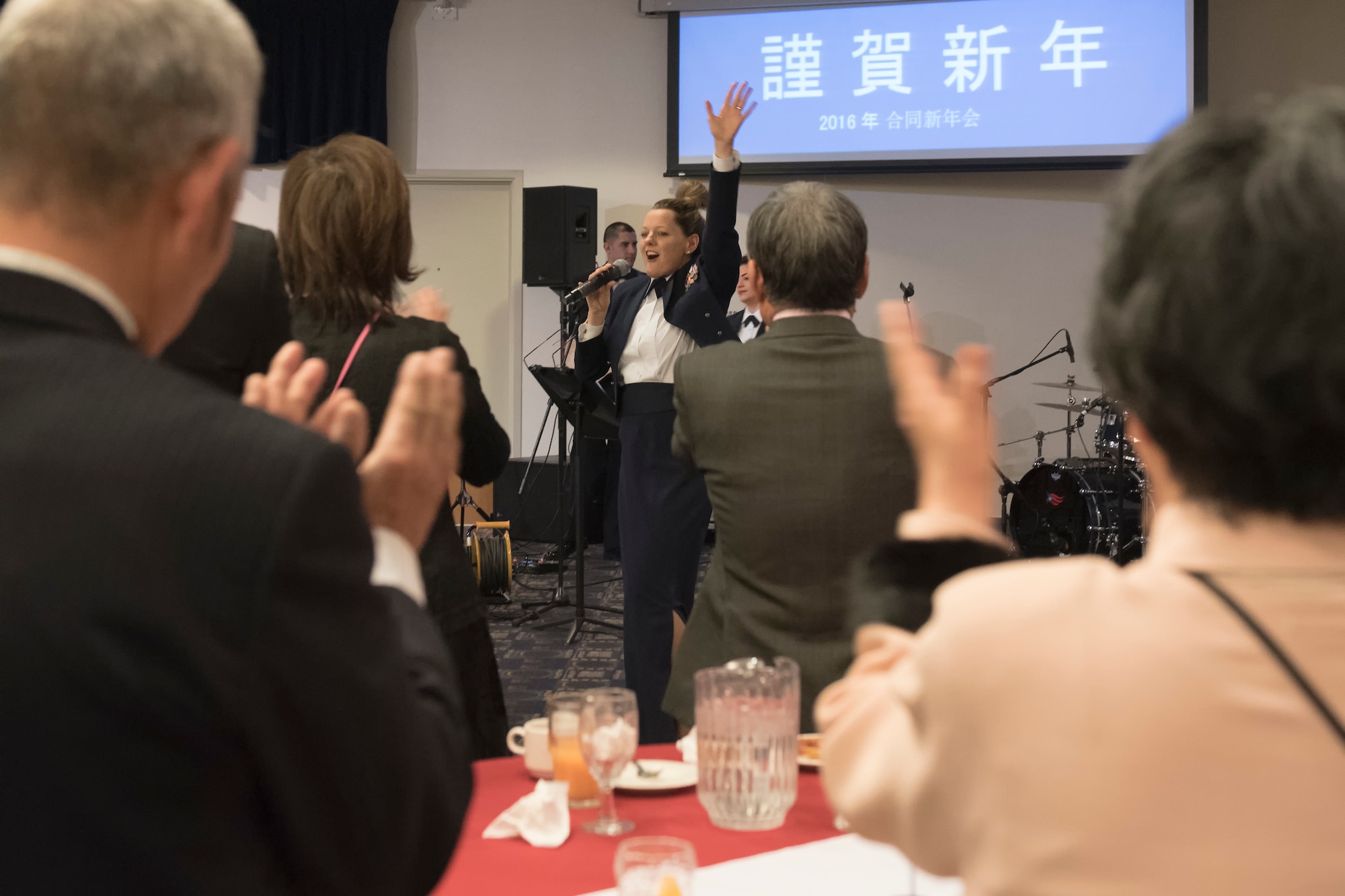 Mater Sgt. Julie Bradley, Air Force Band of the Pacific, Asia, performs during the Joint New Year’s Party at Yokota Air Base, Japan, Jan. 23, 2015. Seven Yokota friendship clubs hosted this event for members of the communities to help strengthen U.S. and Japanese relations, and to thank local organizations for their support during the year. (U.S. Air Force photo by Machiko Imai/Released)  