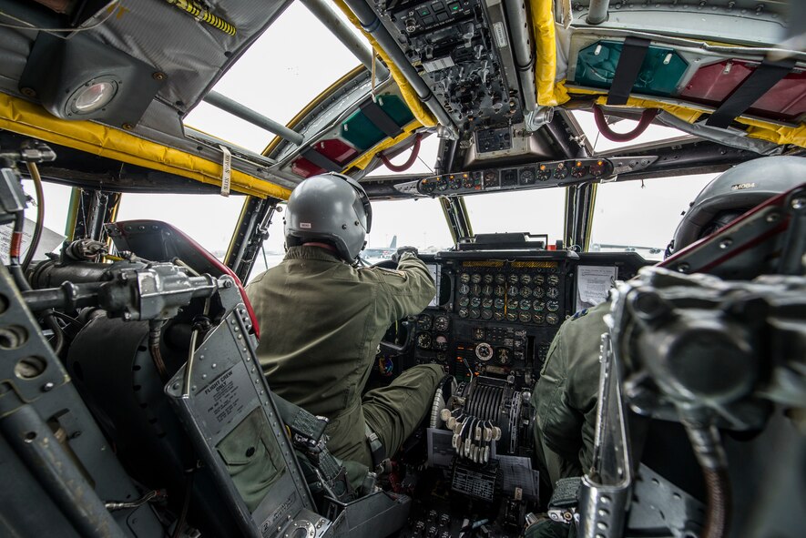 Pilots from the 69th Bomb Squadron go through a pre-flight checklist inside the cockpit of a B-52H Stratofortress before a training sortie at Minot Air Force Base, N.D., Jan. 14, 2016. Bomber Airmen work around the clock in all weather conditions in order to provide B-52H Stratofortress firepower on demand. (U.S. Air Force photo/Airman 1st Class J.T. Armstrong)